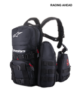 Alpinestars Techdura Tactical Pack, modular off-road and enduro backpack, Black with white Alpinestars logo, featuring MOLLE webbing, multiple removable pouches, and heavy-duty poly-fabric construction for trail storage.