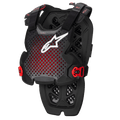 Alpinestars A-1 Pro Chest Protector, negro antracita y rojo, diseño perforado transpirable con logotipo blanco, correas ajustables con hebillas rojas, patrón de ventilación hexagonal, armadura protectora ligera para motocross y conducción off-road
