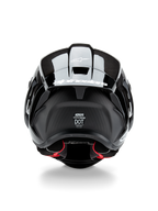 Alpinestars Supertech R10 Solid Helmet, Motorcycle Helmet, Black Carbon Matte and Glossy, rear view featuring carbon fiber texture, aerodynamic spoiler with white Alpinestars logo, DOT and ECE safety certification labels, and red interior padding