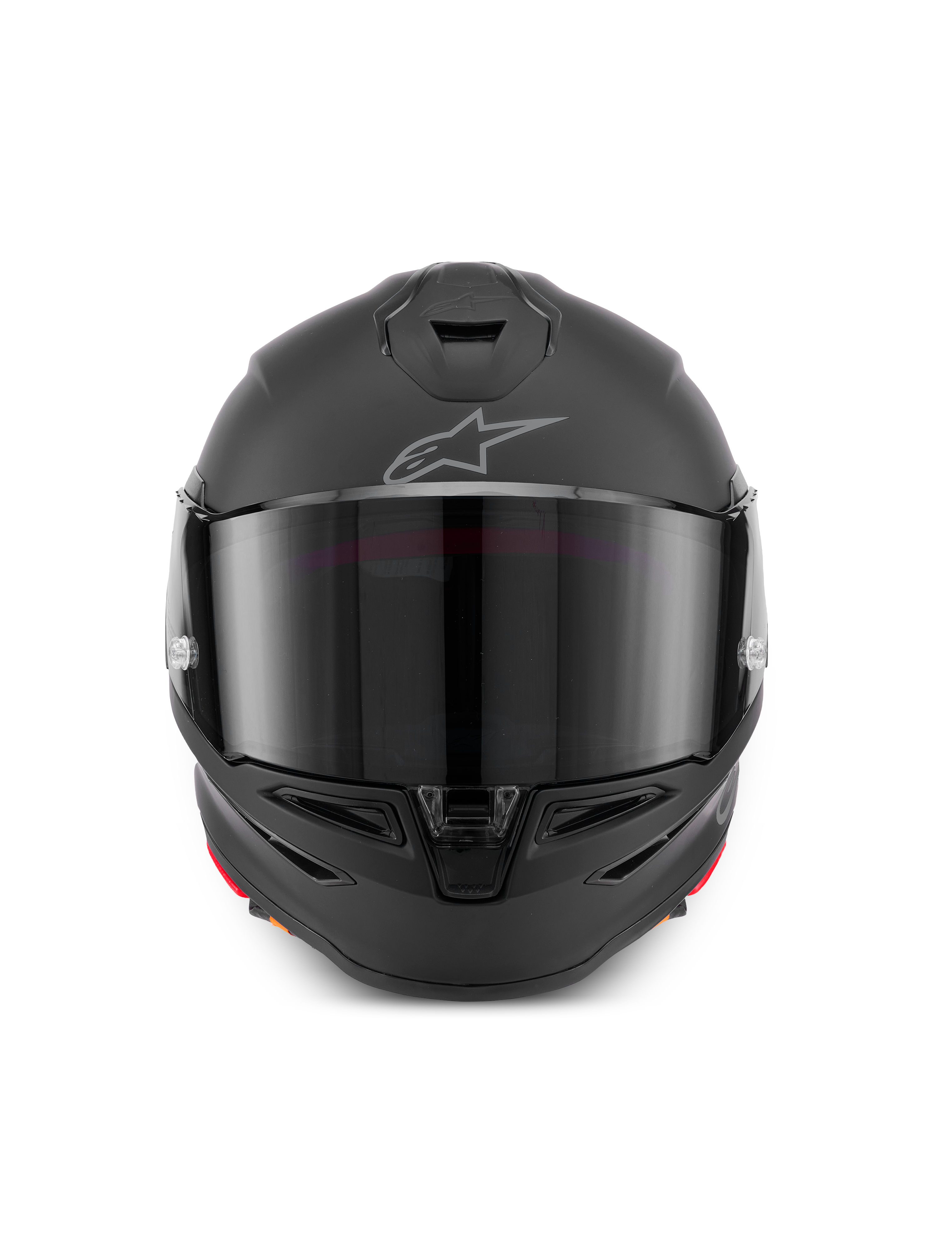 Casco Alpinestars S-R7 Solid, casco de moto integral en negro mate, vista frontal que muestra la calota aerodinámica con visor oscuro, ventilaciones integradas en la mentonera y en la parte superior, y el emblemático logotipo Astar en la frente.