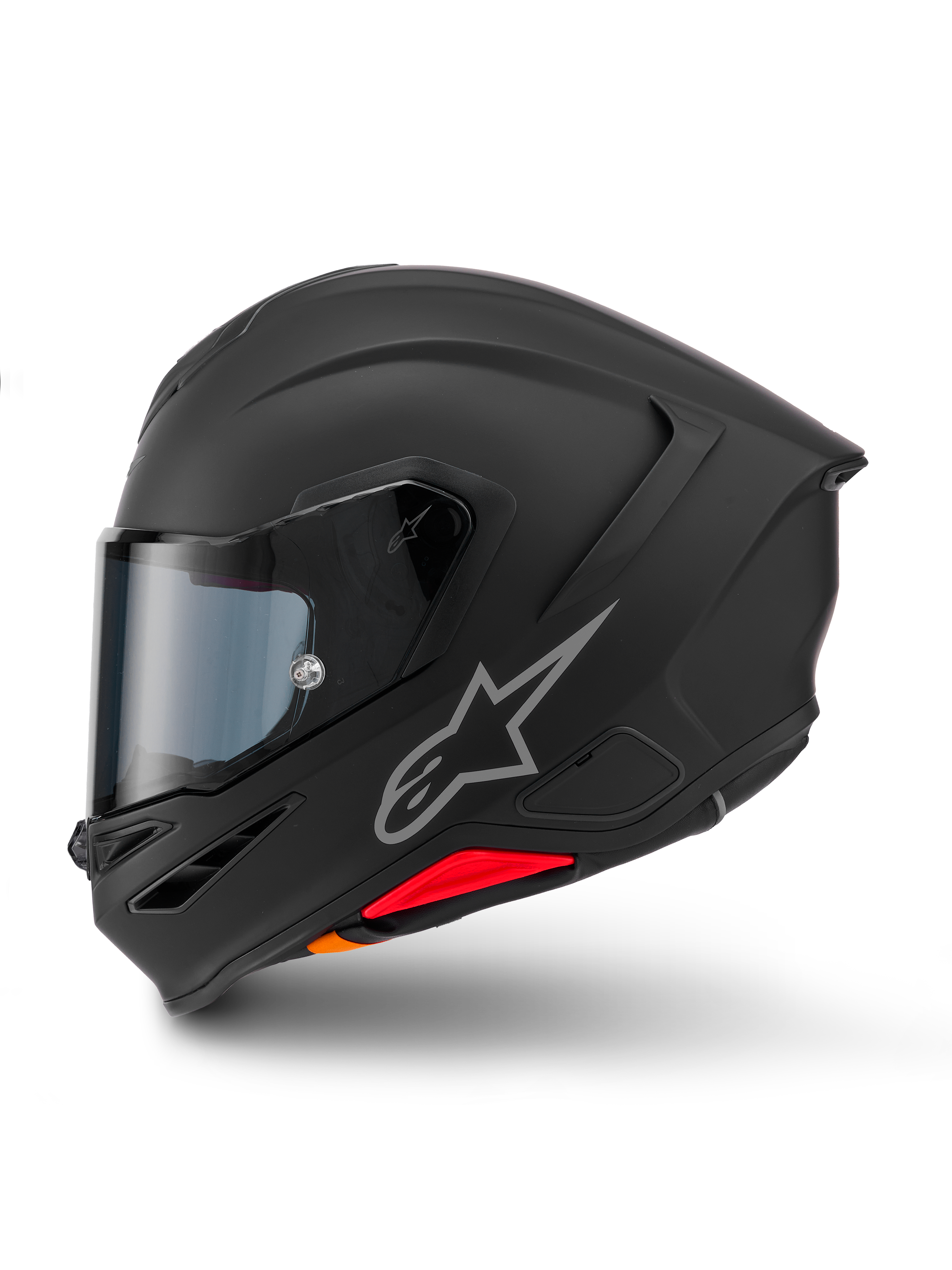 Casco Alpinestars S-R7 Solid, casco integral de moto, negro mate, vista de perfil lateral, con el logotipo plateado de Astars en el lateral, diseño aerodinámico con alerón integrado y ventilaciones en la mentonera, y detalles en rojo y naranja en la base.
