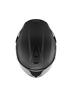 Casco Alpinestars S-R7 Solid, casco integral de competición, negro mate, vista superior que muestra la construcción aerodinámica de la calota, puertos de ventilación integrados y el sutil logotipo de Alpinestars.