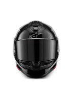 Casco Alpinestars S-R7 Solid, casco de moto integral, negro brillante, vista frontal con visor ahumado oscuro, calota aerodinámica estilizada con ventilaciones en la mentonera y en la parte superior, sutil logotipo plateado de Alpinestars en la frente