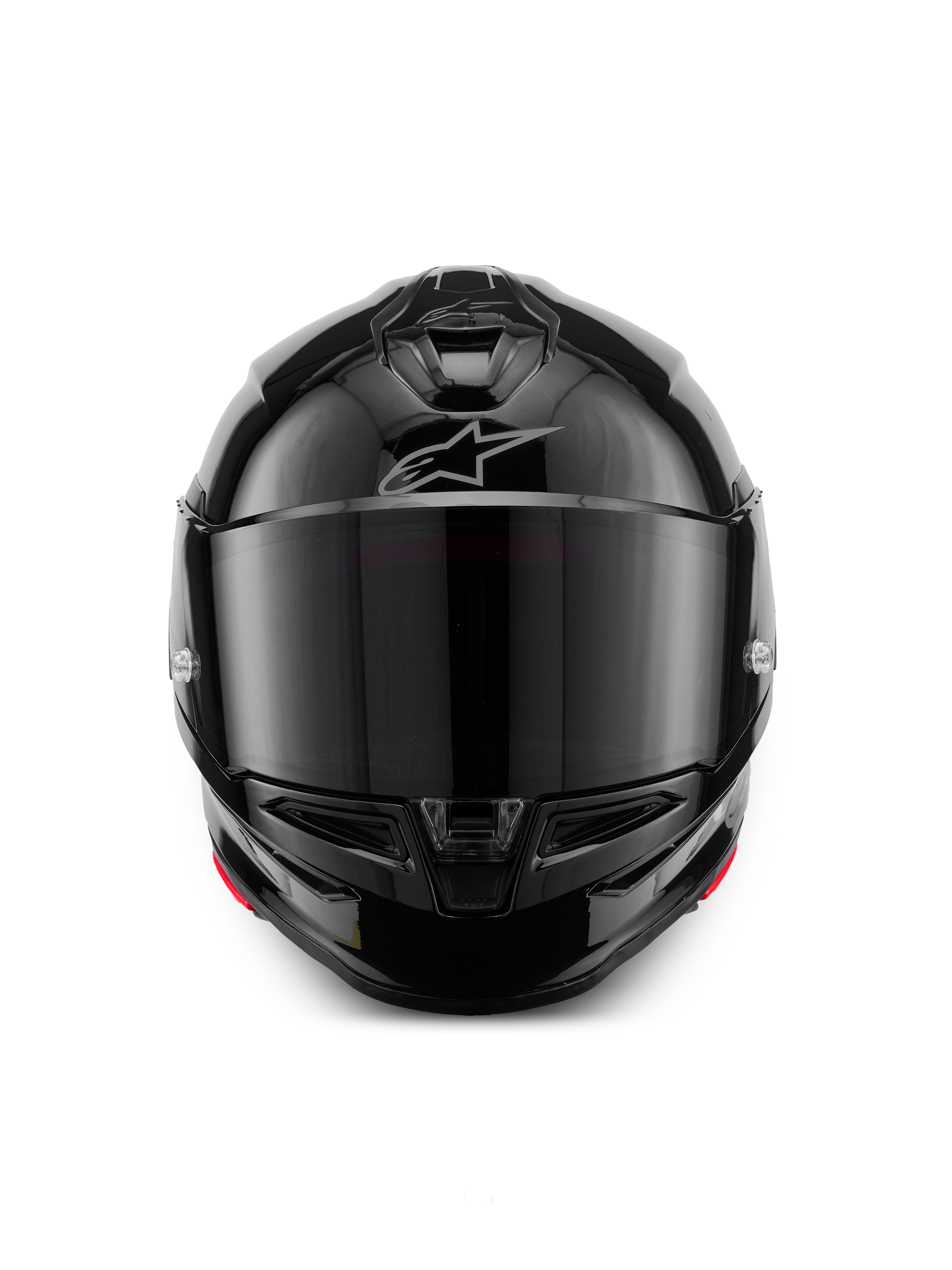Casco Alpinestars S-R7 Solid, casco de moto integral, negro brillante, vista frontal con visor ahumado oscuro, calota aerodinámica estilizada con ventilaciones en la mentonera y en la parte superior, sutil logotipo plateado de Alpinestars en la frente