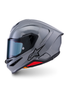 Casco Alpinestars S-R7 Solid, casco de moto integral, Gris Brillante, perfil lateral que muestra un diseño aerodinámico elegante con alerón integrado, logotipo de estrella negra y detalle en rojo en la base