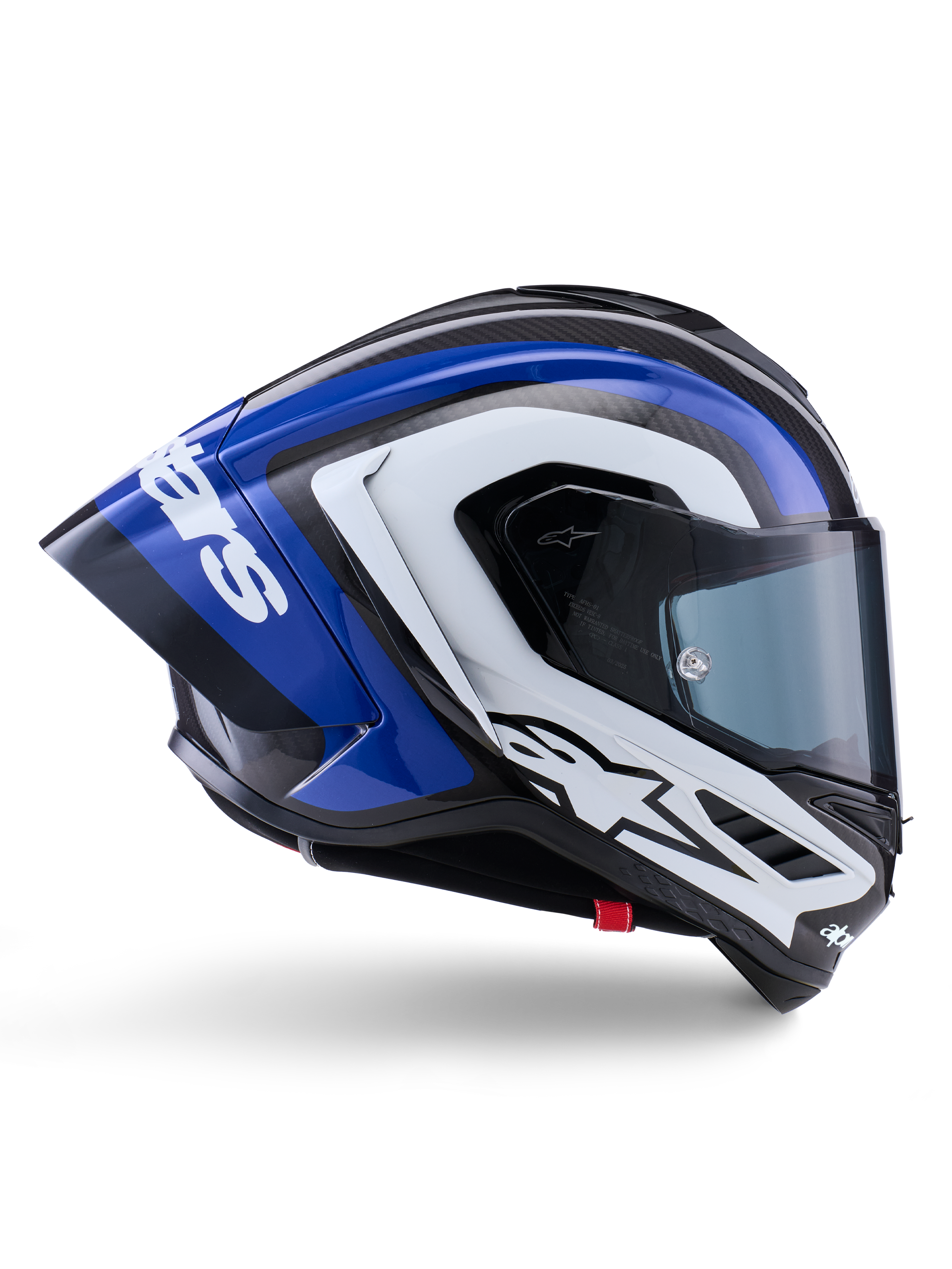 Casco Alpinestars Supertech R10 Arius, casco integral de competición, acabado brillante en negro, blanco y azul, vista lateral aerodinámica que muestra la calota de fibra de carbono y un gran alerón trasero con el logo de Alpinestars, equipamiento de protección profesional para motociclismo