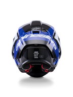 Casco Alpinestars Supertech R10 Arius, vista trasera, negro, blanco y azul brillante, construcción en fibra de carbono con logotipo blanco prominente, forma aerodinámica, etiqueta con certificación DOT y acolchado interior rojo