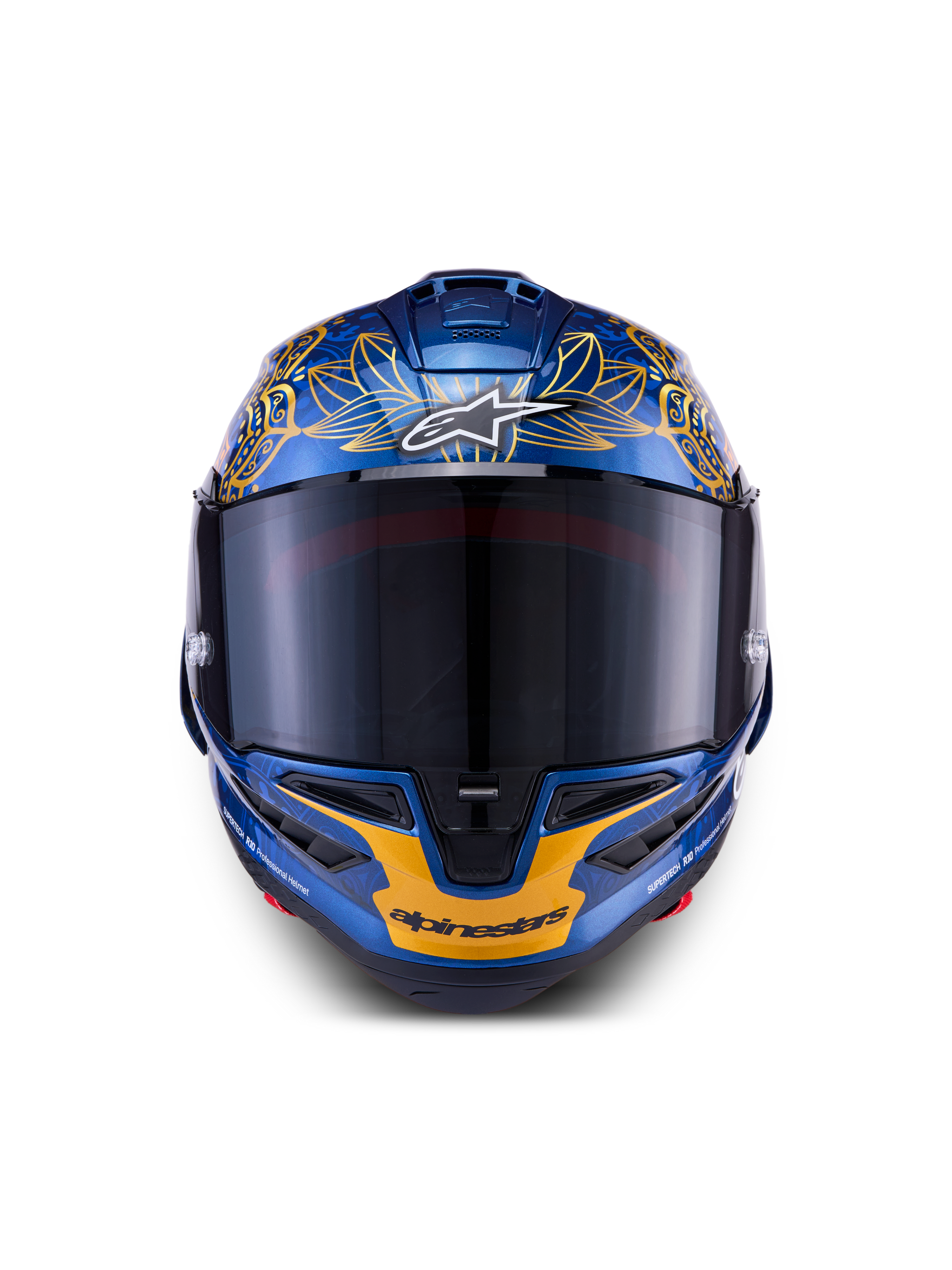 Casco Alpinestars Supertech R10 Martinator Thai LE de fibra de carbono azul y dorado con visor ahumado frontal.