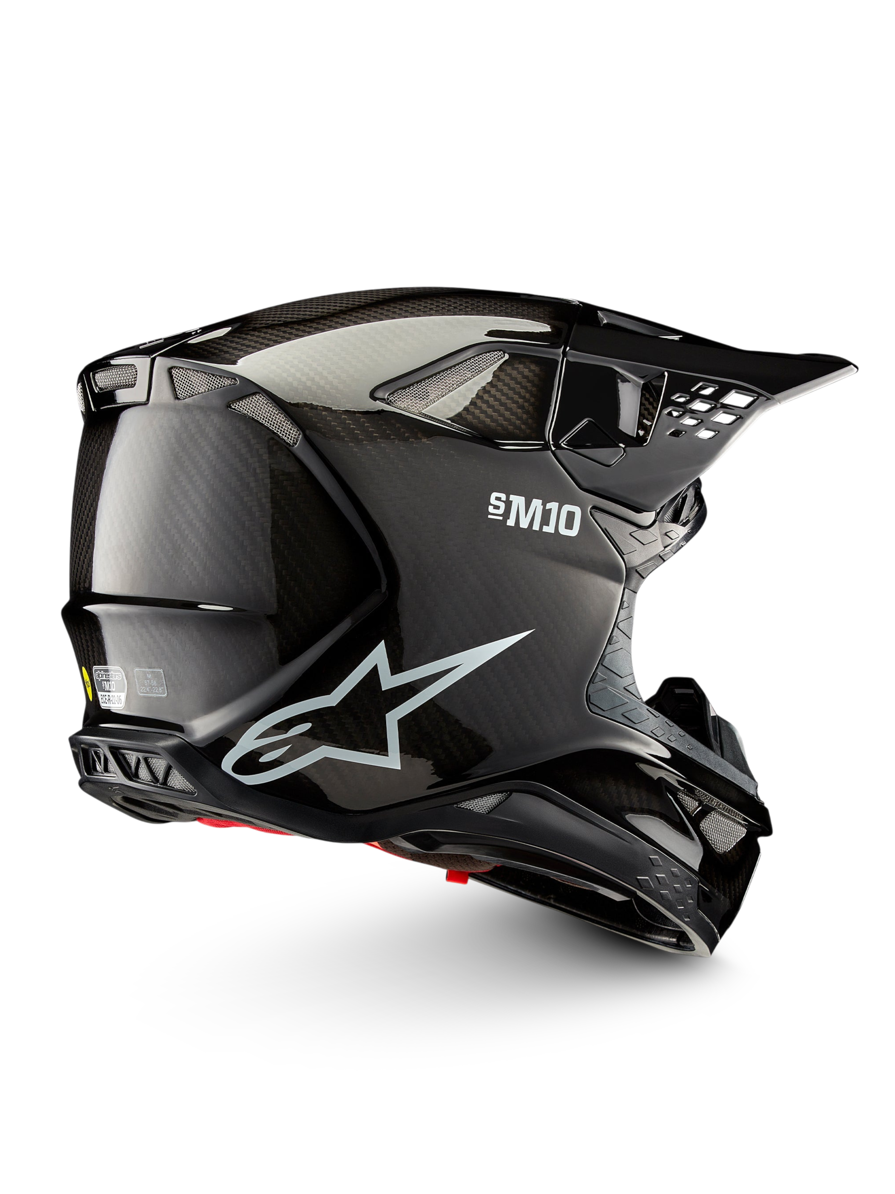 Alpinestars Supertech M10 Solid ECE 22.06, casco de motocross negro de carbono brillante, vista lateral con puertos de ventilación y visera de pico, certificado ECE