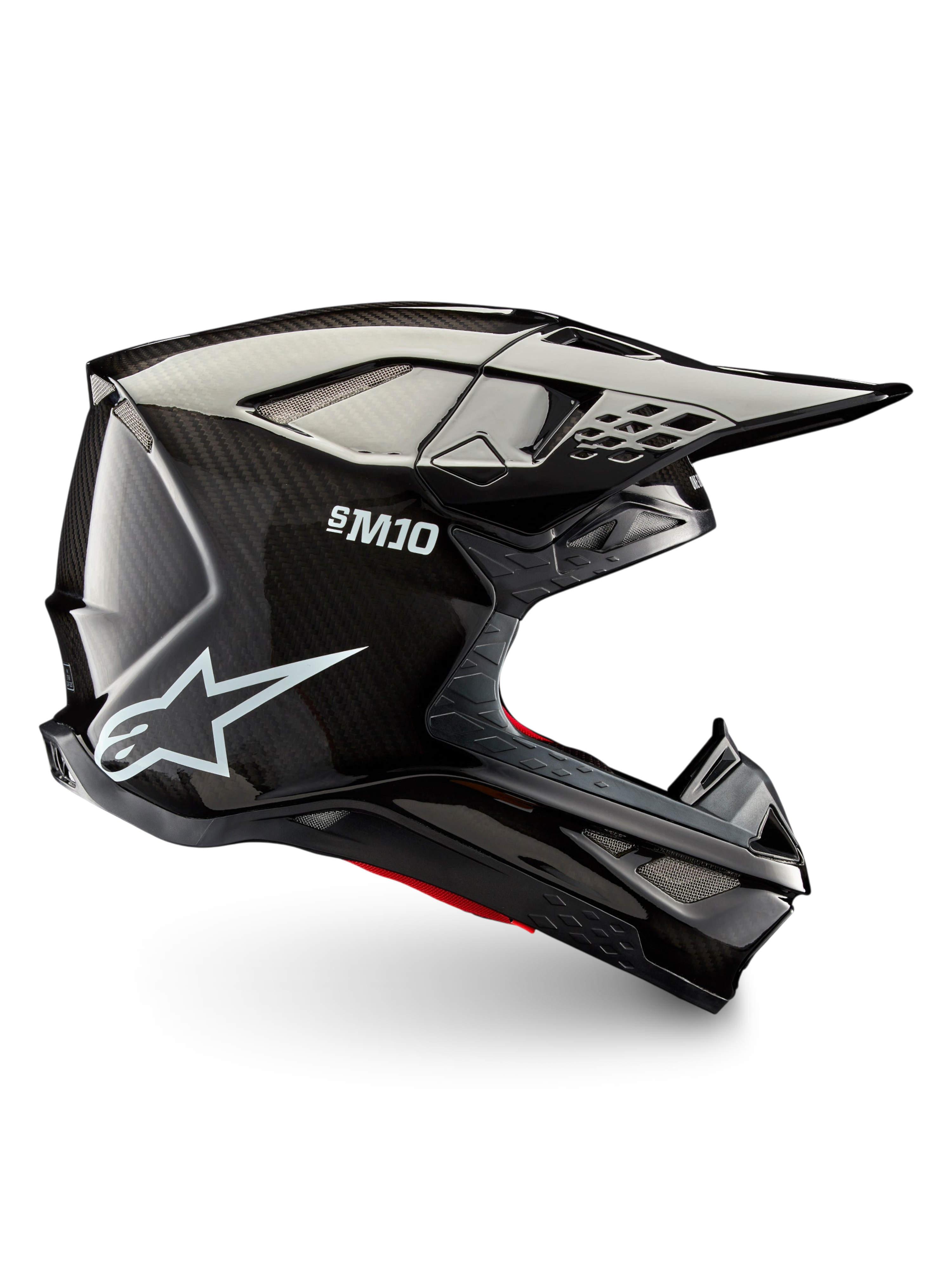 Casco Alpinestars Supertech M10 Solid ECE 22.06, casco de motocross para off-road, perfil lateral en carbono negro brillante, carcasa de carbono, visor y puertos de ventilación