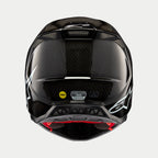 Casco Alpinestars Supertech M10 Solid, carbono negro brillante, vista trasera que muestra el tejido de fibra de carbono brillante, logotipo de Alpinestars en blanco, pegatinas de certificación MIPS y ECE, forma aerodinámica con puertos de ventilación