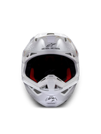 Alpinestars Supertech M10 Solid ECE 22.06, casco de motocross blanco brillante, vista frontal con acolchado interior rojo y negro