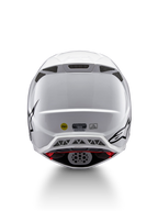 Alpinestars Supertech M10 Solid ECE 22.06, casco de motocross blanco brillante con gráficos negros, visto desde atrás, con puertos de ventilación, sistema MIPS y certificación ECE
