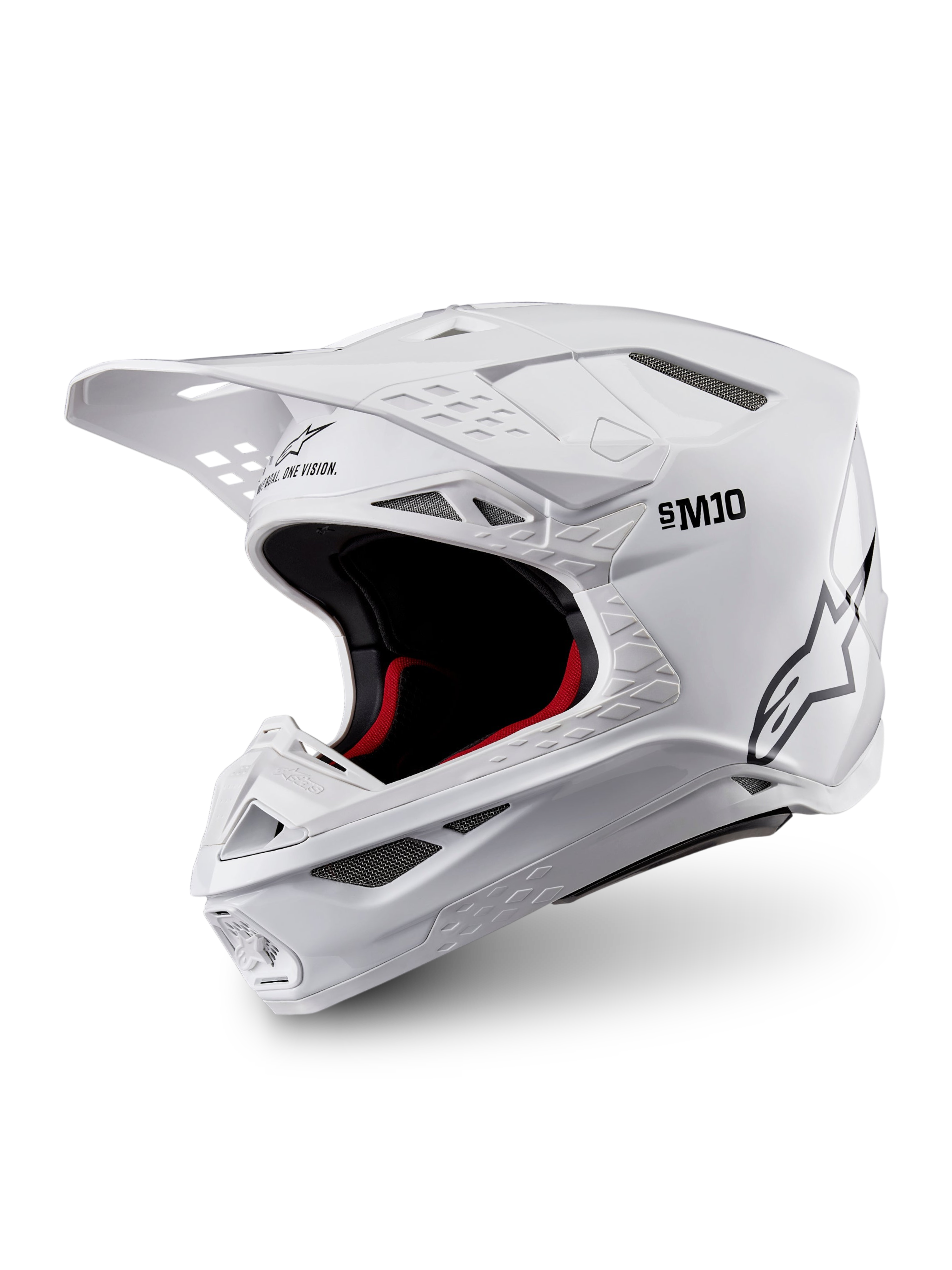 Alpinestars Casco Supertech M10 Solid ECE 22.06, casco de motocross blanco brillante con acolchado interior negro y rojo, visor superior y múltiples puertos de ventilación, vista de tres cuartos
