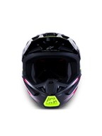 Casco Alpinestars S-M7 Blaster ECE06, casco de motocross para carreras off-road, negro con detalles en amarillo flúor y rosa, vista frontal con aberturas de ventilación.