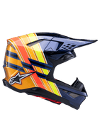 Casco Alpinestars Supertech M10 TLD Edition 25, casco de motocross, azul oscuro metalizado con franjas vibrantes en naranja, amarillo y rojo, vista de perfil lateral, acabado brillante con logotipos de Alpinestars y Troy Lee Designs, carcasa aerodinámica con múltiples ventilaciones de malla para carreras todoterreno