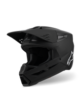 Casco Alpinestars S-M3 Solid ECE 22.06, casco de motocross, negro mate, vista lateral de tres cuartos con visera grande y entradas de aire, carcasa aerodinámica con el logotipo blanco de Alpinestars, equipo profesional para carreras todoterreno