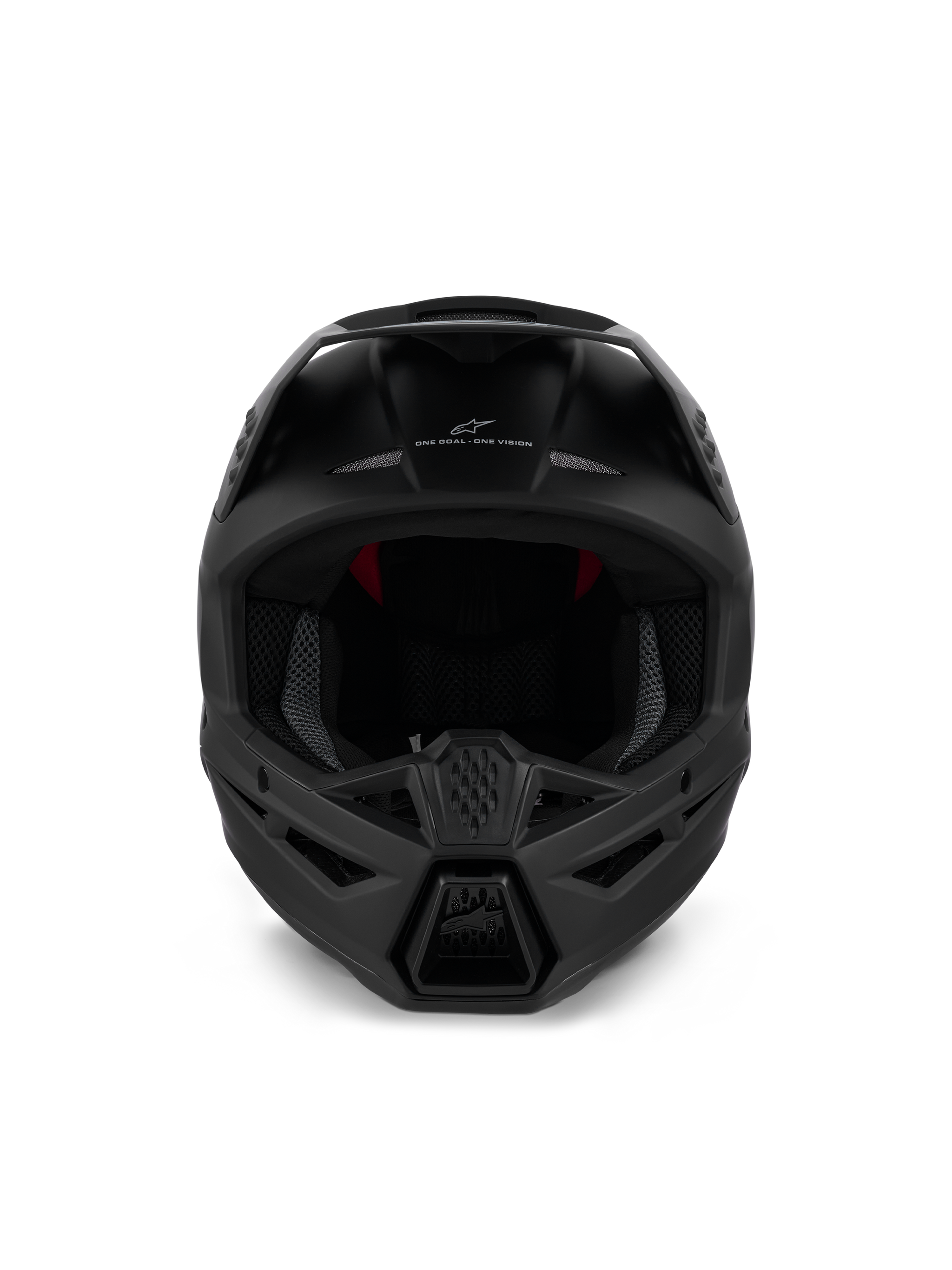 Alpinestars S-M3 Solid Helmet ECE 22.06, casco de motocross, negro mate, vista frontal que muestra la ventilación agresiva de la mentonera y el lema 'ONE GOAL - ONE VISION', diseño aerodinámico para carreras todoterreno