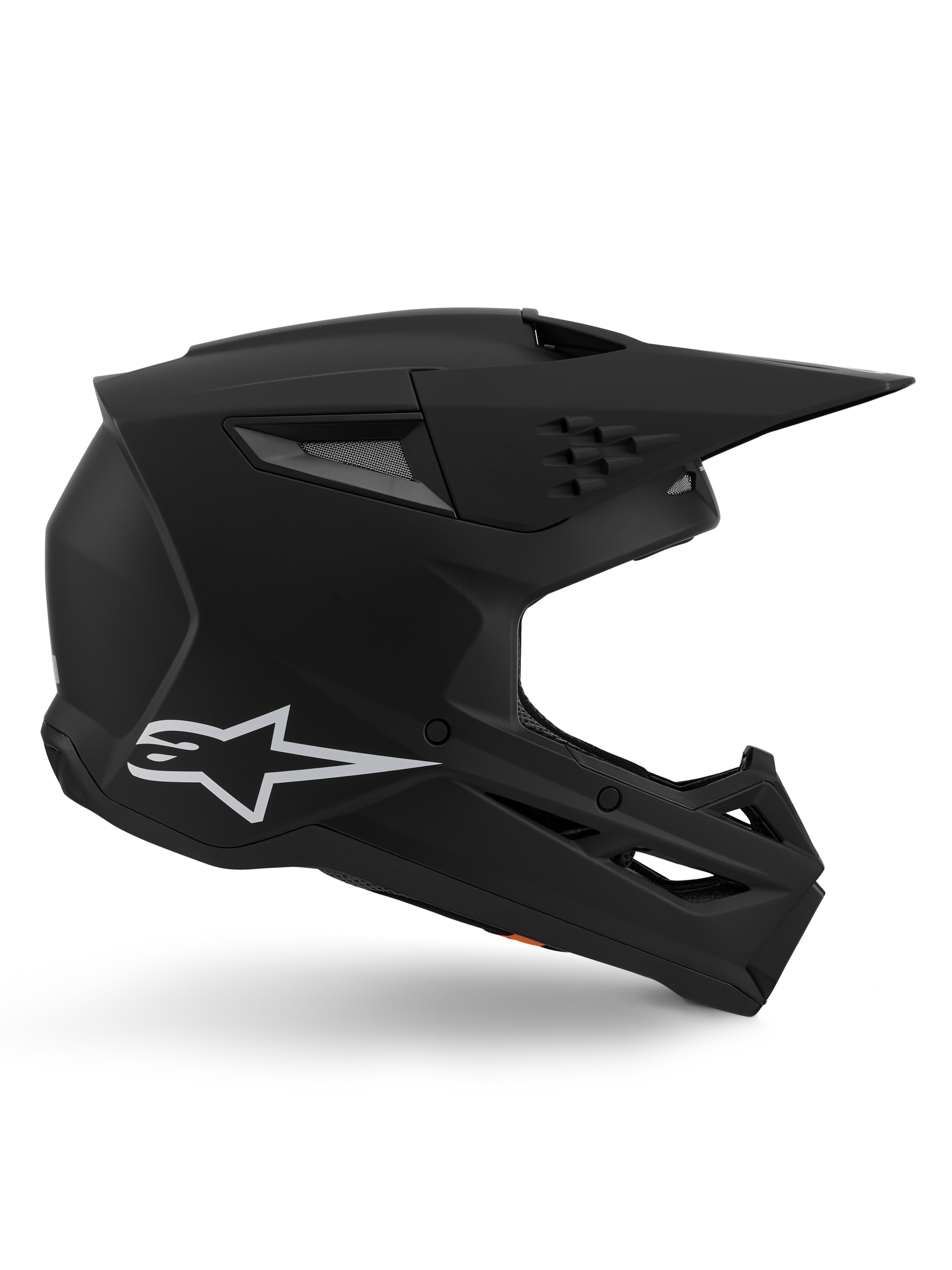 Casco Alpinestars S-M3 Solid, casco de motocross, acabado en negro mate, perfil lateral con el logotipo de Alpinestars en blanco, carcasa aerodinámica con múltiples puertos de ventilación y visera grande, equipo de protección profesional para off-road
