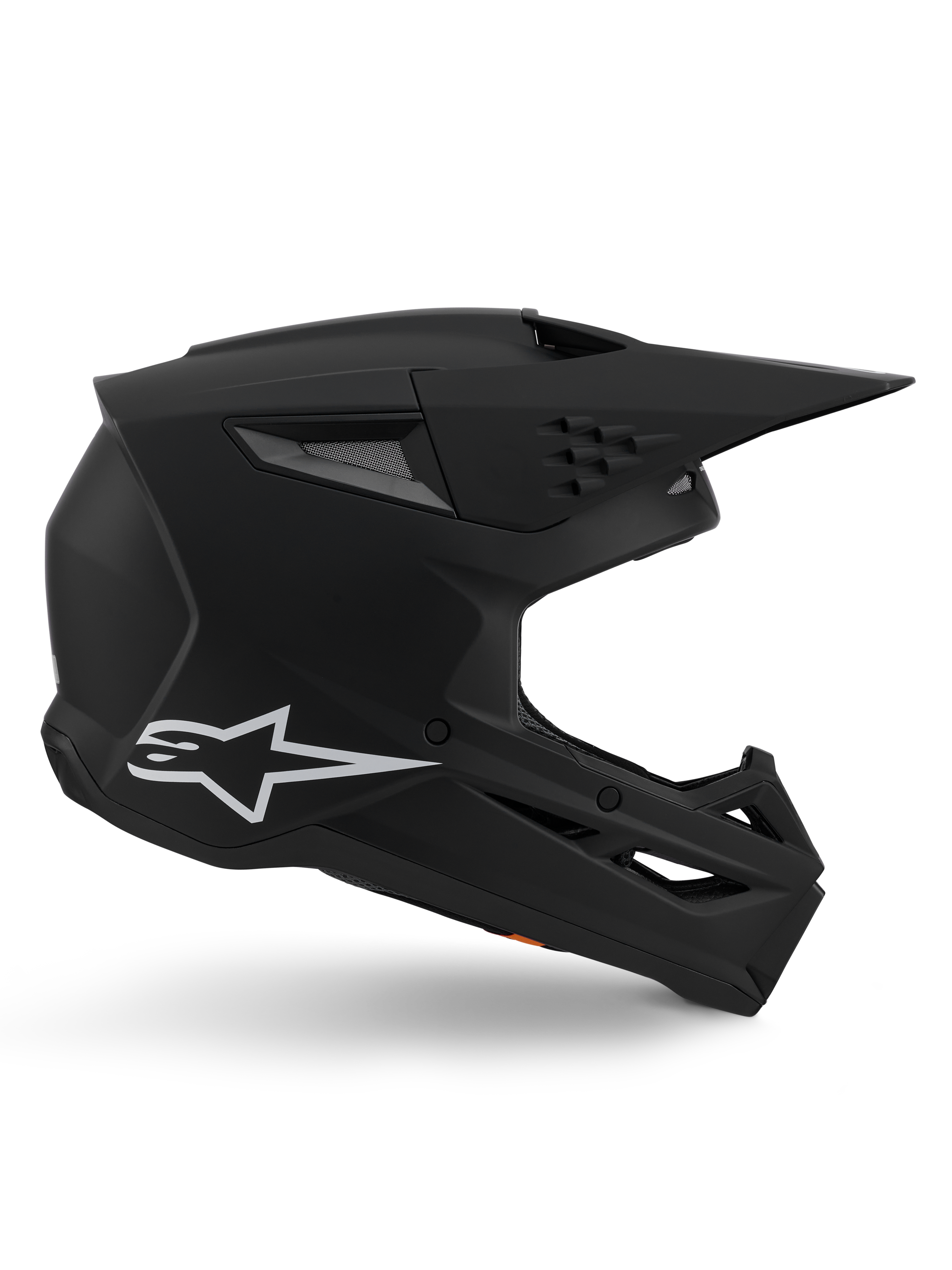 Casco Alpinestars S-M3 Solid, casco de motocross, acabado en negro mate, perfil lateral con el logotipo de Alpinestars en blanco, carcasa aerodinámica con múltiples puertos de ventilación y visera grande, equipo de protección profesional para off-road