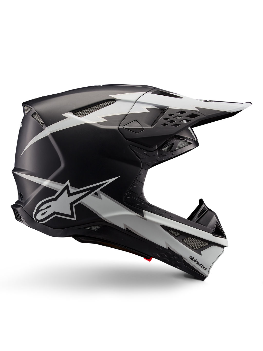 Alpinestars Supertech M10 Ampress Helmet, casco de competición para motocross, negro y blanco mate, perfil aerodinámico con gráficos de rayos blancos, múltiples ventilaciones de aire, visera extendida, construcción de fibra de carbono con acabado mate