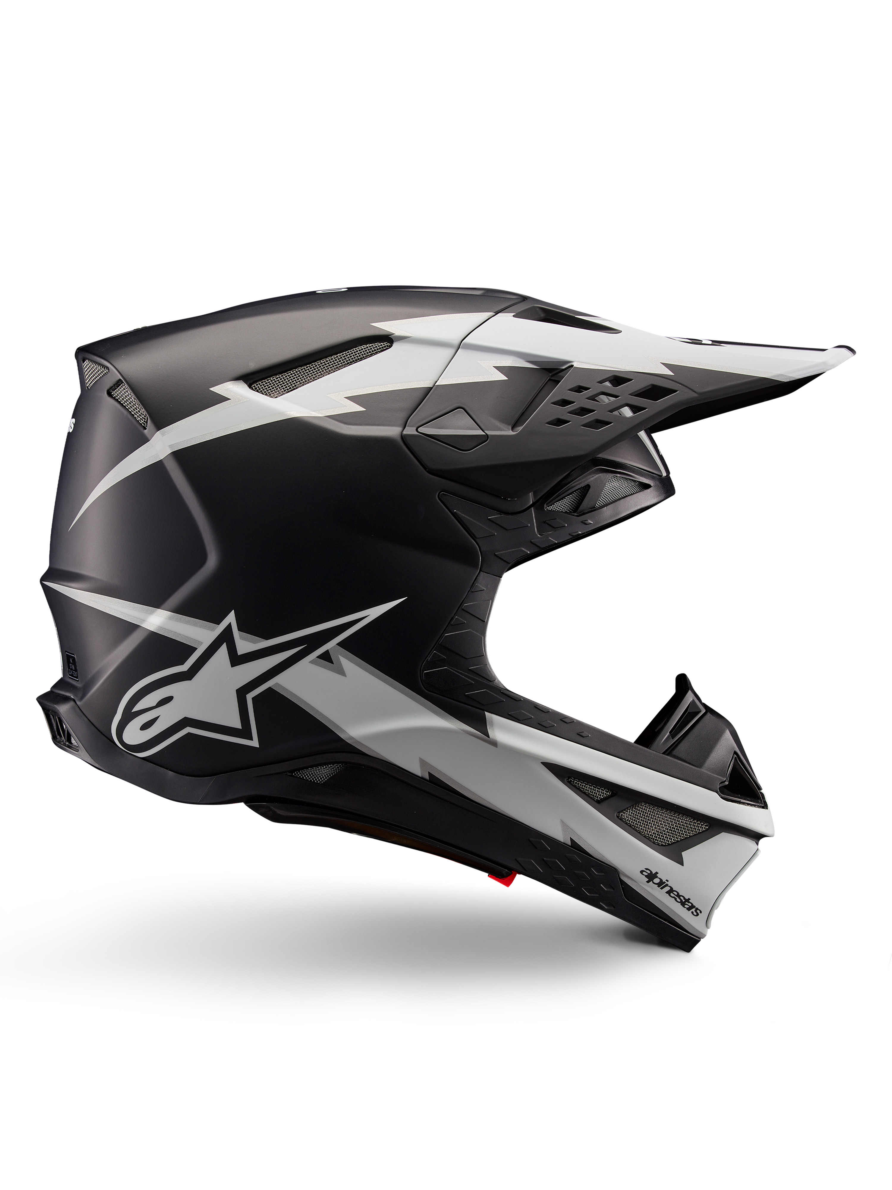 Alpinestars Supertech M10 Ampress Helmet, casco de competición para motocross, negro y blanco mate, perfil aerodinámico con gráficos de rayos blancos, múltiples ventilaciones de aire, visera extendida, construcción de fibra de carbono con acabado mate
