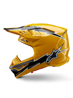Casco Alpinestars Supertech M10 Ampress, casco de motocross, amarillo brillante con gráficos en negro y blanco, vista lateral con diseños angulares llamativos, logotipo de la estrella de Alpinestars y múltiples puertos de ventilación con malla plateada, equipo profesional de carreras off-road