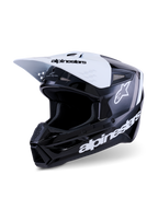 Casco Alpinestars S-M3 Radium, casco de motocross, negro, blanco y gris brillante, con visera blanca con marca en negro, calota negra brillante con logotipos blancos de Alpinestars destacados y detalles gráficos en gris, diseño aerodinámico para carreras off-road