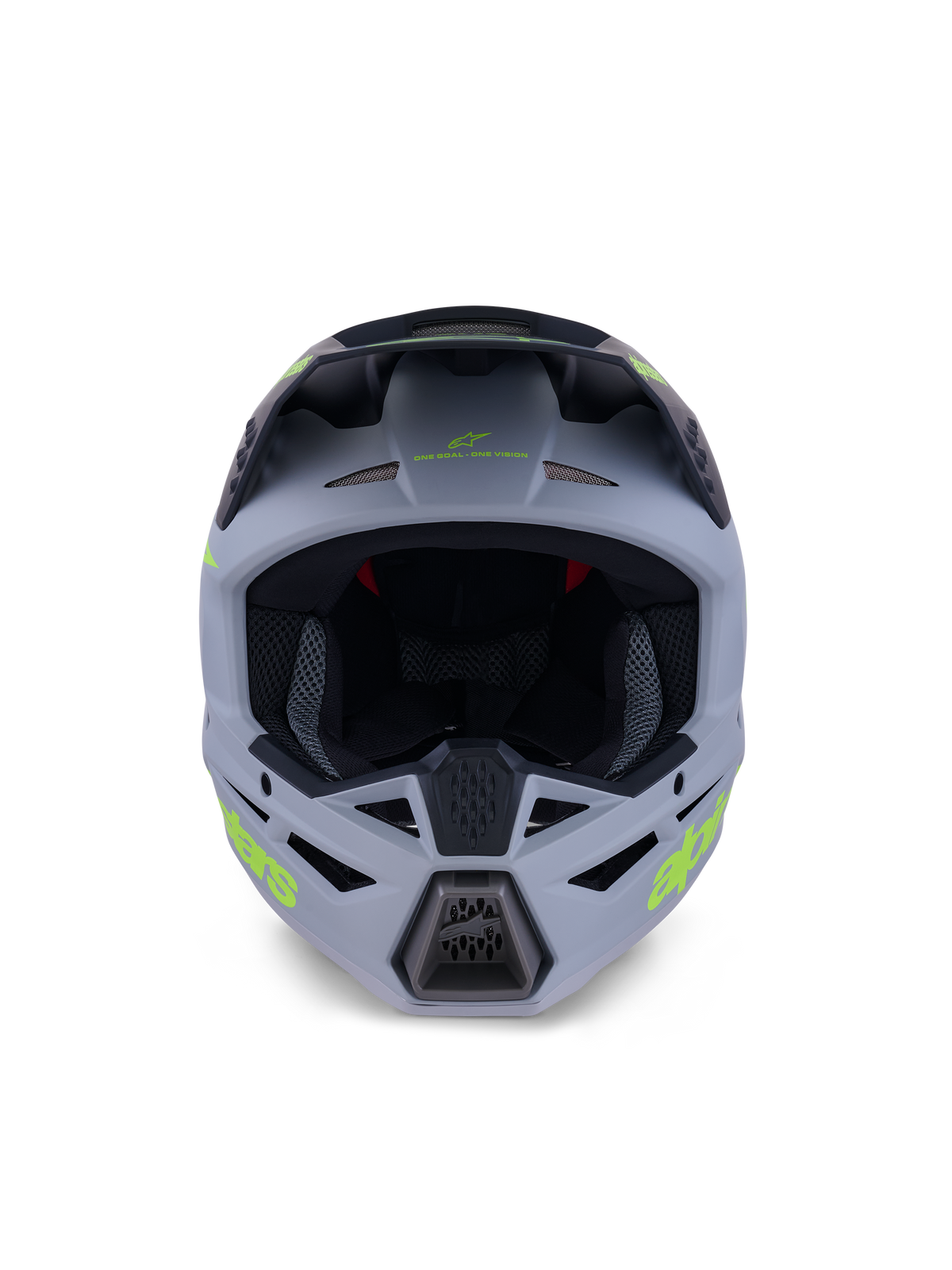 Casco Alpinestars S-M3 Radium, casco integral de motocross, verde mate y negro con logotipos en amarillo flúor, vista frontal que destaca los puertos de ventilación de la mentonera y la frente con una gran apertura frontal, equipo de protección profesional para off-road