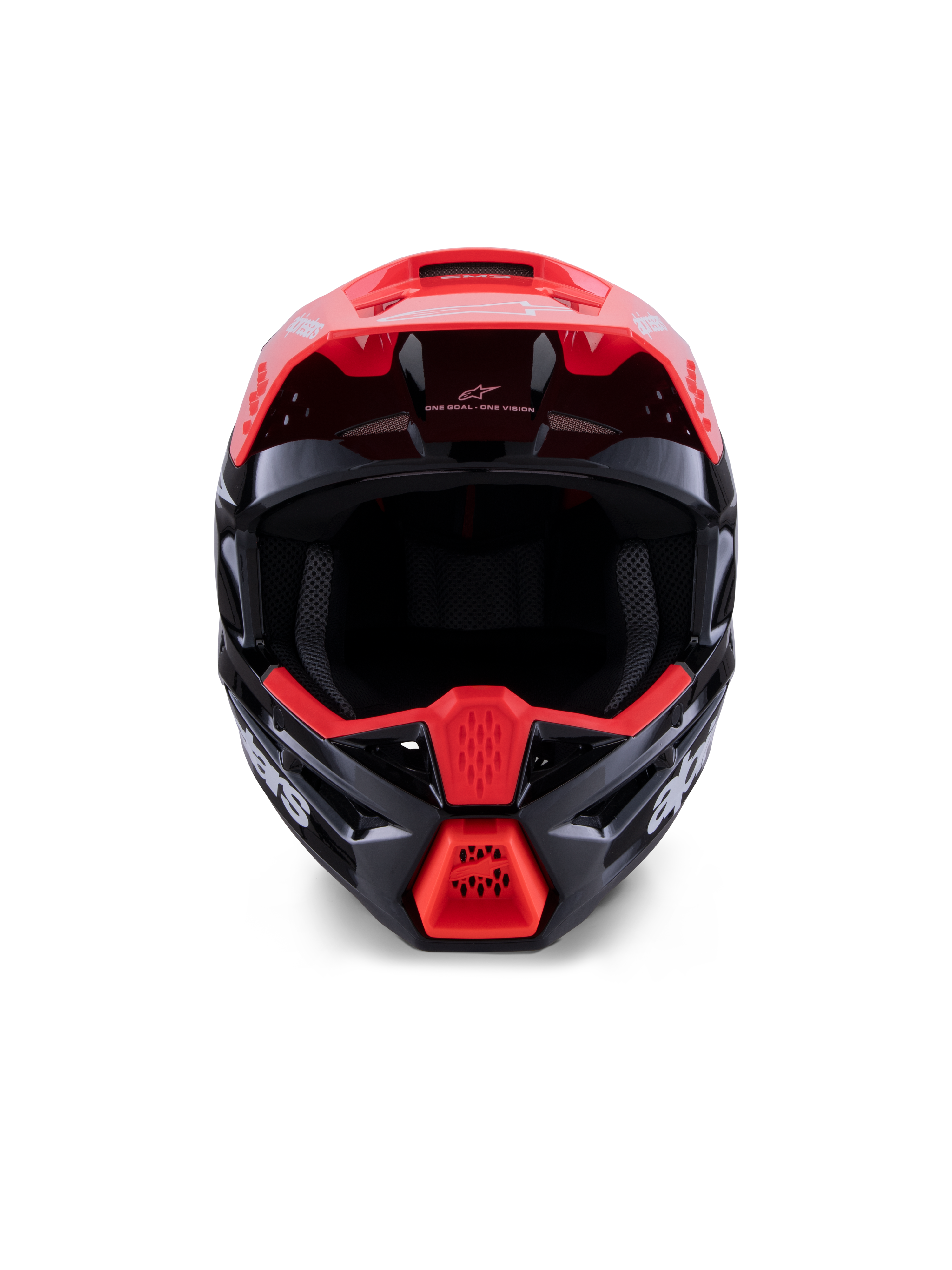 Alpinestars S-M3 Radium Helmet ECE 22.06, casco de motocross, negro brillante con detalles en rojo fluorescente y blanco, vista frontal que muestra la carcasa aerodinámica, el visor integrado y la mentonera protectora con el logotipo de Alpinestars destacado.