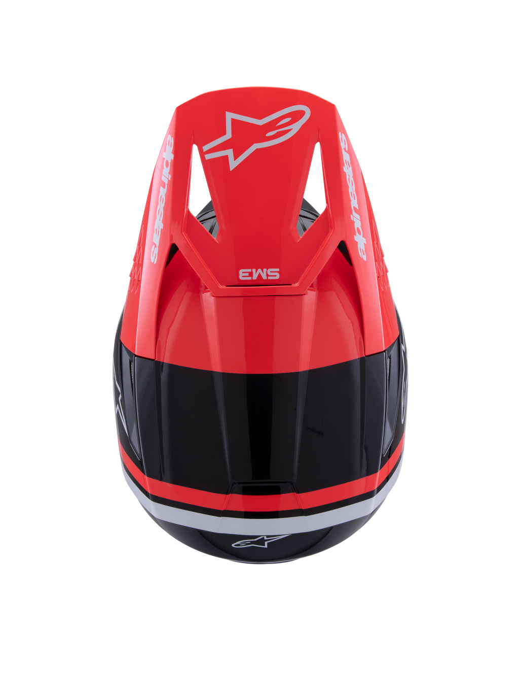 Casco Alpinestars S-M3 Radium, casco de motocross, negro, rojo flúor y blanco brillante, vista superior con la visera rojo flúor, marca Alpinestars en blanco y diseño aerodinámico elegante.