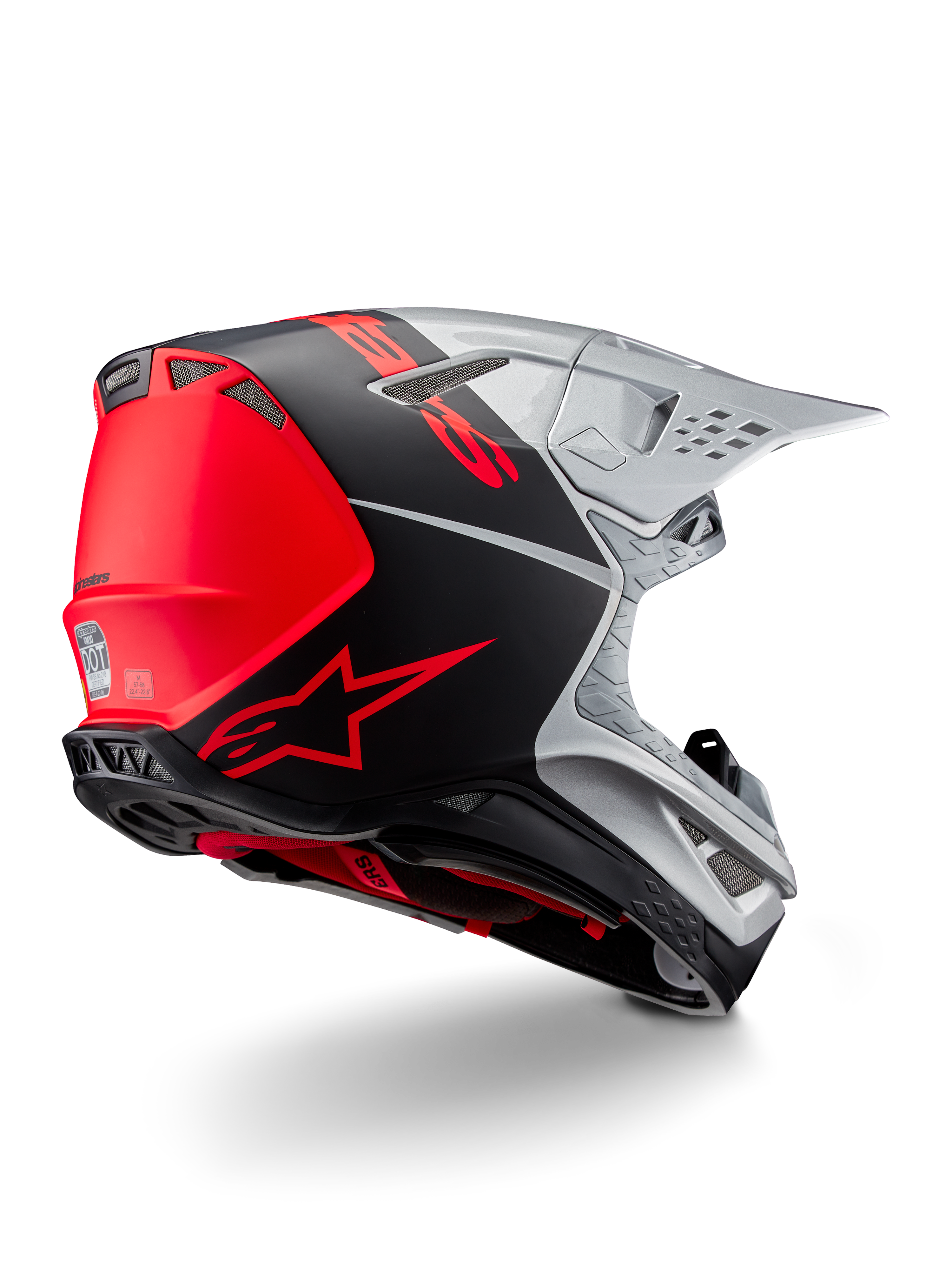Casco Alpinestars Supertech M10 Flood ECE 22.06, casco de motocross, plateado, negro y naranja flúor, vista lateral trasera que destaca el diseño aerodinámico de la calota, los puertos de ventilación y el acabado mate y brillante