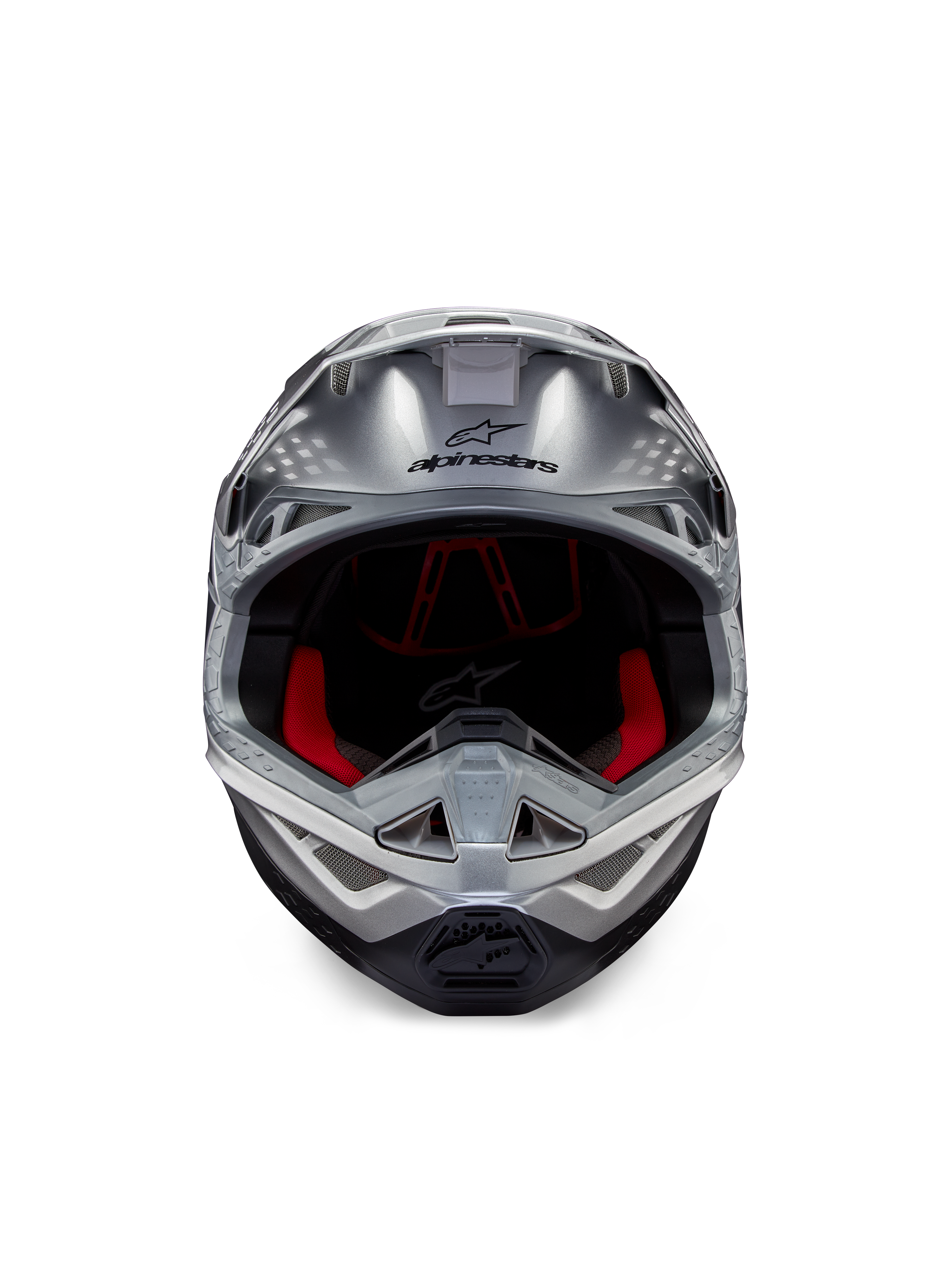 Casco Alpinestars Supertech M10 Flood ECE 22.06, casco de motocross, plata, negro y naranja flúor, vista frontal con calota aerodinámica, amplia apertura para la visión con acolchado interior rojo, logotipo de Alpinestars en negro y mentonera ventilada para competición off-road