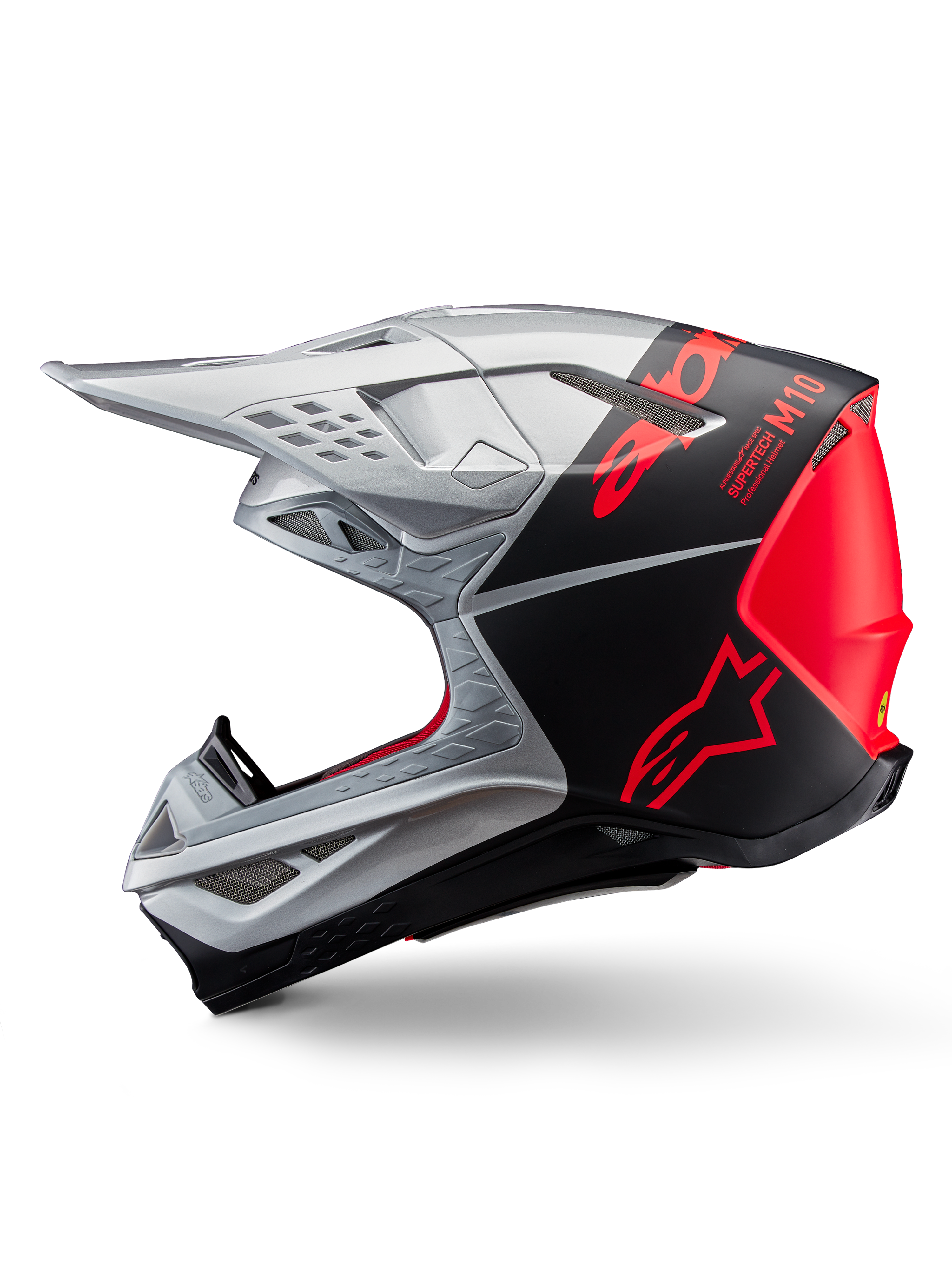 Casco Alpinestars Supertech M10 Flood, casco de motocross, plateado y negro con detalles en naranja fluorescente, perfil lateral, diseño aerodinámico elegante con puertos de ventilación, acabado mate y brillante, protección profesional para carreras off-road