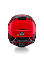 Casco Alpinestars Supertech M10 Flood, vista trasera, plata, negro y naranja fluorescente mate, con salidas de aire integradas, adhesivos de certificación DOT y ECE, logotipo amarillo de Mips y perfil aerodinámico para carreras de motocross