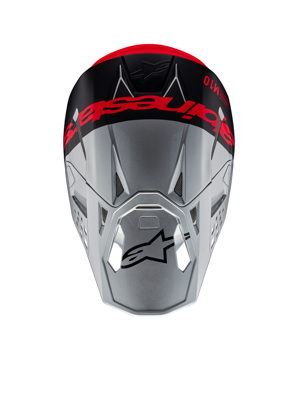 Casco Alpinestars Supertech M10 Flood ECE 22.06, casco de motocross, plateado y negro con naranja fluorescente, vista superior que muestra la marca llamativa en la corona, logotipo Astars negro en la visera, perfil aerodinámico con puertos de ventilación, texturas mate y brillantes.