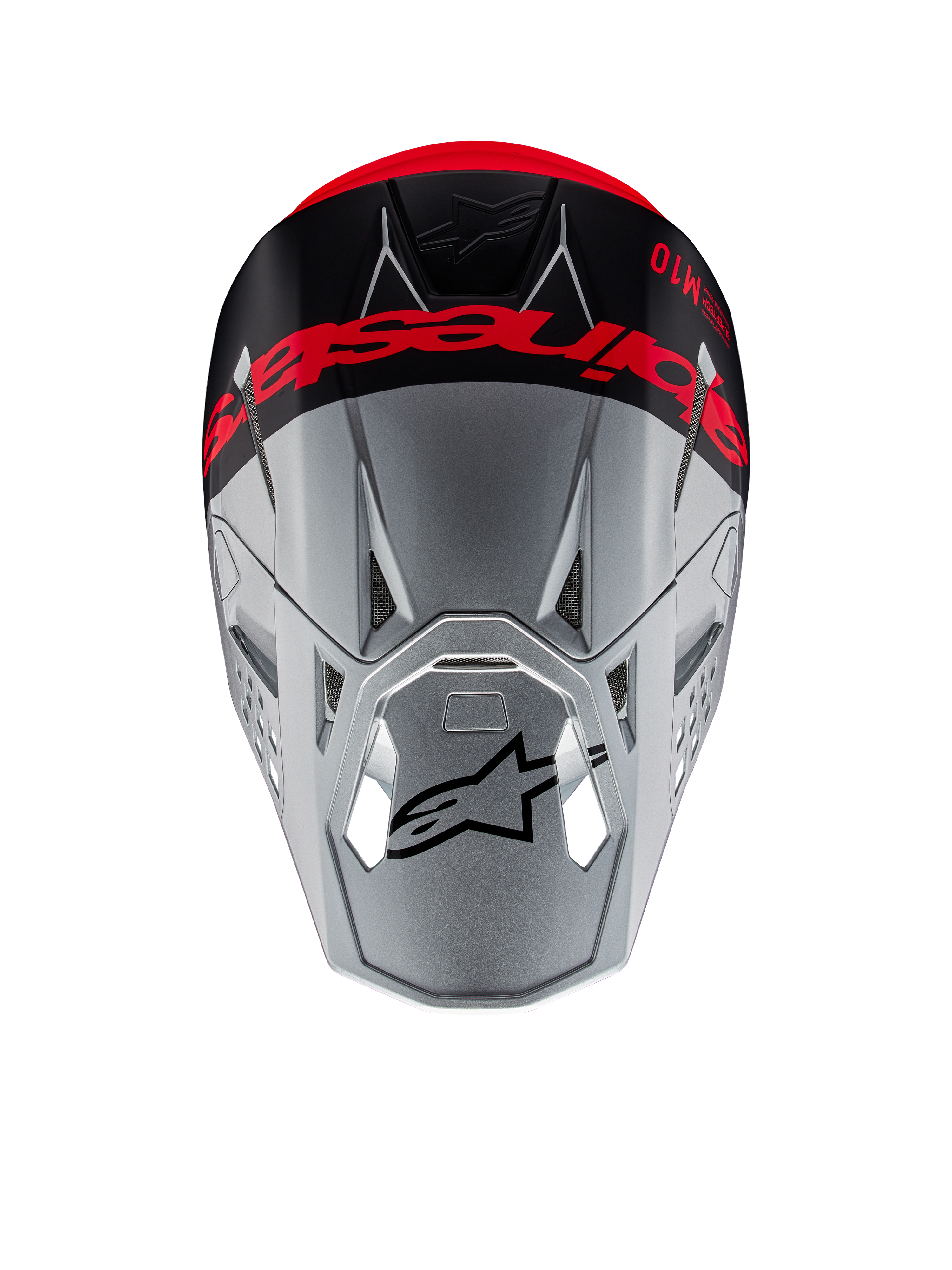 Casco Alpinestars Supertech M10 Flood ECE 22.06, casco de motocross, plateado y negro con naranja fluorescente, vista superior que muestra la marca llamativa en la corona, logotipo Astars negro en la visera, perfil aerodinámico con puertos de ventilación, texturas mate y brillantes.