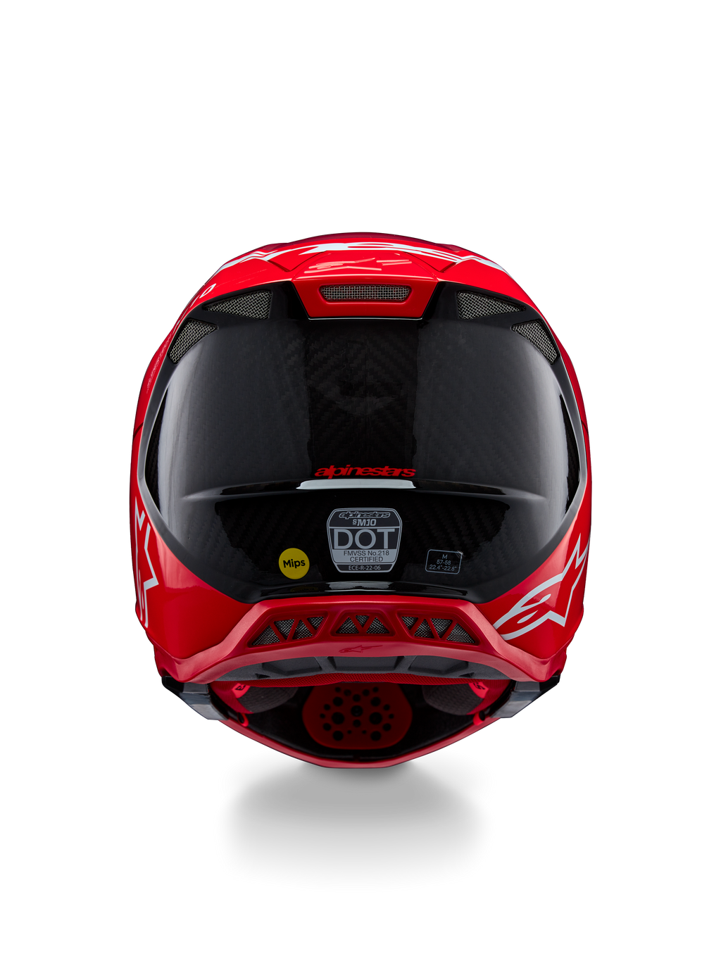 Casco Alpinestars Supertech M10 Flood ECE 22.06, vista trasera, rojo flúor rojo mate y brillante, casco de motocross con textura de fibra de carbono visible, pegatinas de certificación MIPS y DOT, y puertos de ventilación aerodinámicos.