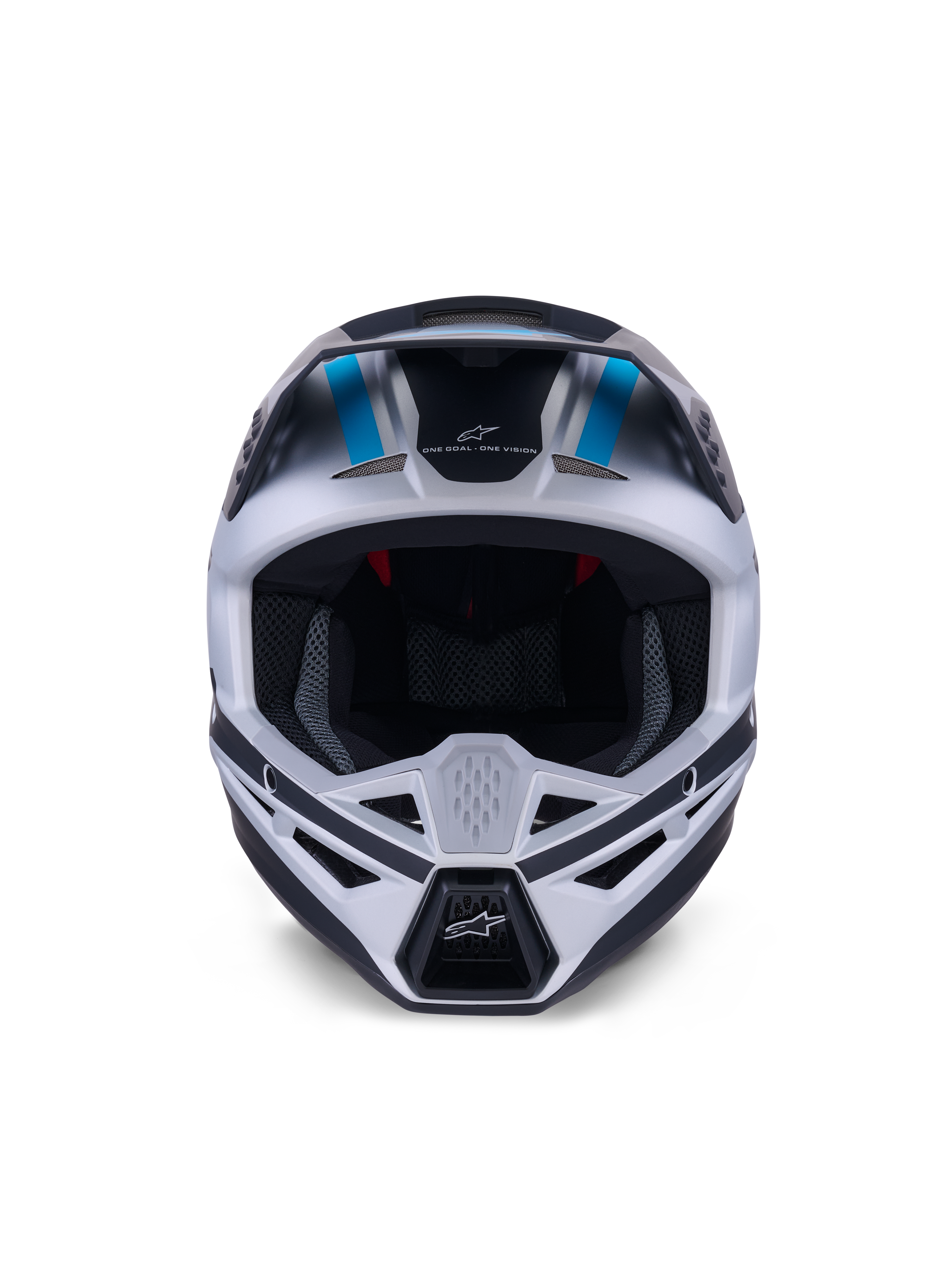 Casco Alpinestars S-M3 Heat, casco de motocross, color plata, azul y negro mate, vista frontal que destaca el sistema de ventilación, la amplia apertura para las gafas y el acolchado interior de malla, con el eslogan de la marca 'ONE GOAL ONE VISION' en la frente.