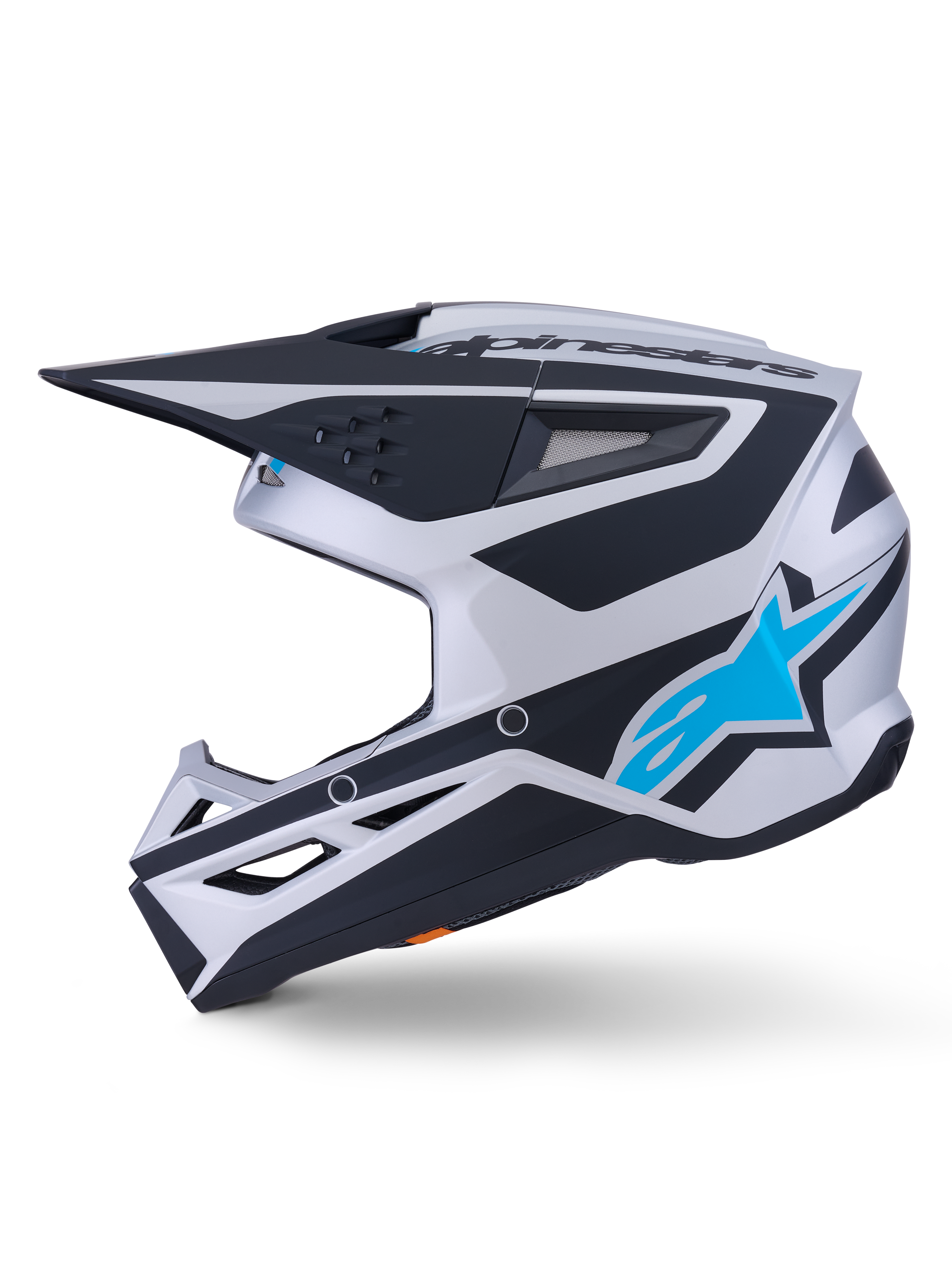 Alpinestars S-M3 Heat Helmet ECE 22.06, casco de motocross, acabado mate plata, azul y negro, vista de perfil lateral, con logotipo de la estrella Alpinestars en azul brillante, visera negra y múltiples puertos de ventilación, diseño aerodinámico agresivo para carreras todoterreno