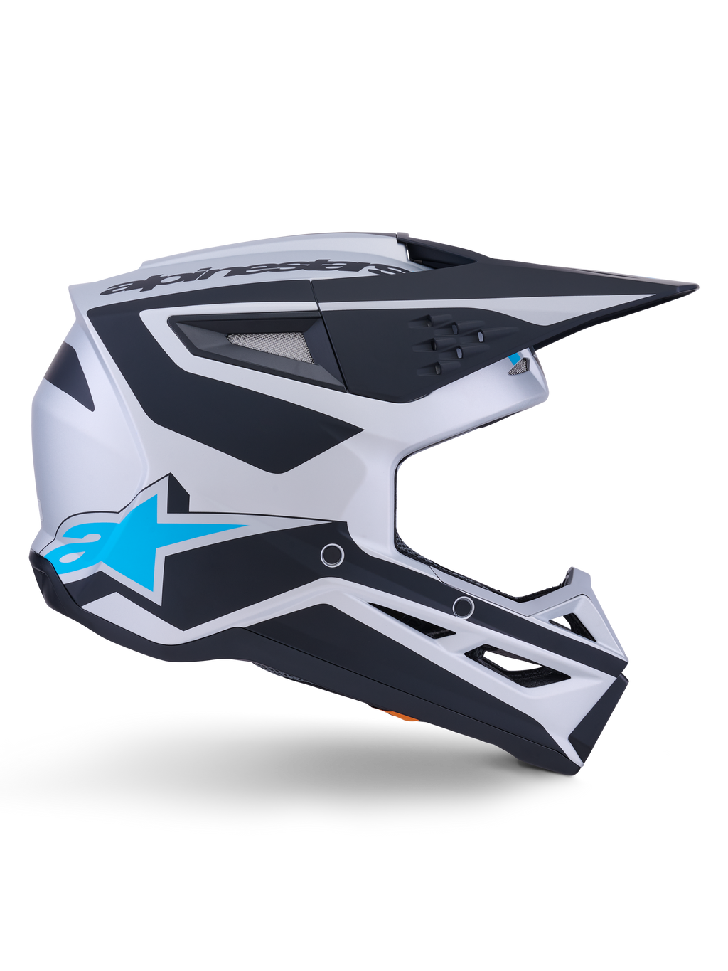 Alpinestars S-M3 Heat Helmet ECE 22.06, casco de motocross, plata, azul y negro mate, vista de perfil lateral con llamativos gráficos en negro, logotipo A-star en azul brillante, visera aerodinámica negra y múltiples puertos de ventilación para rendimiento off-road