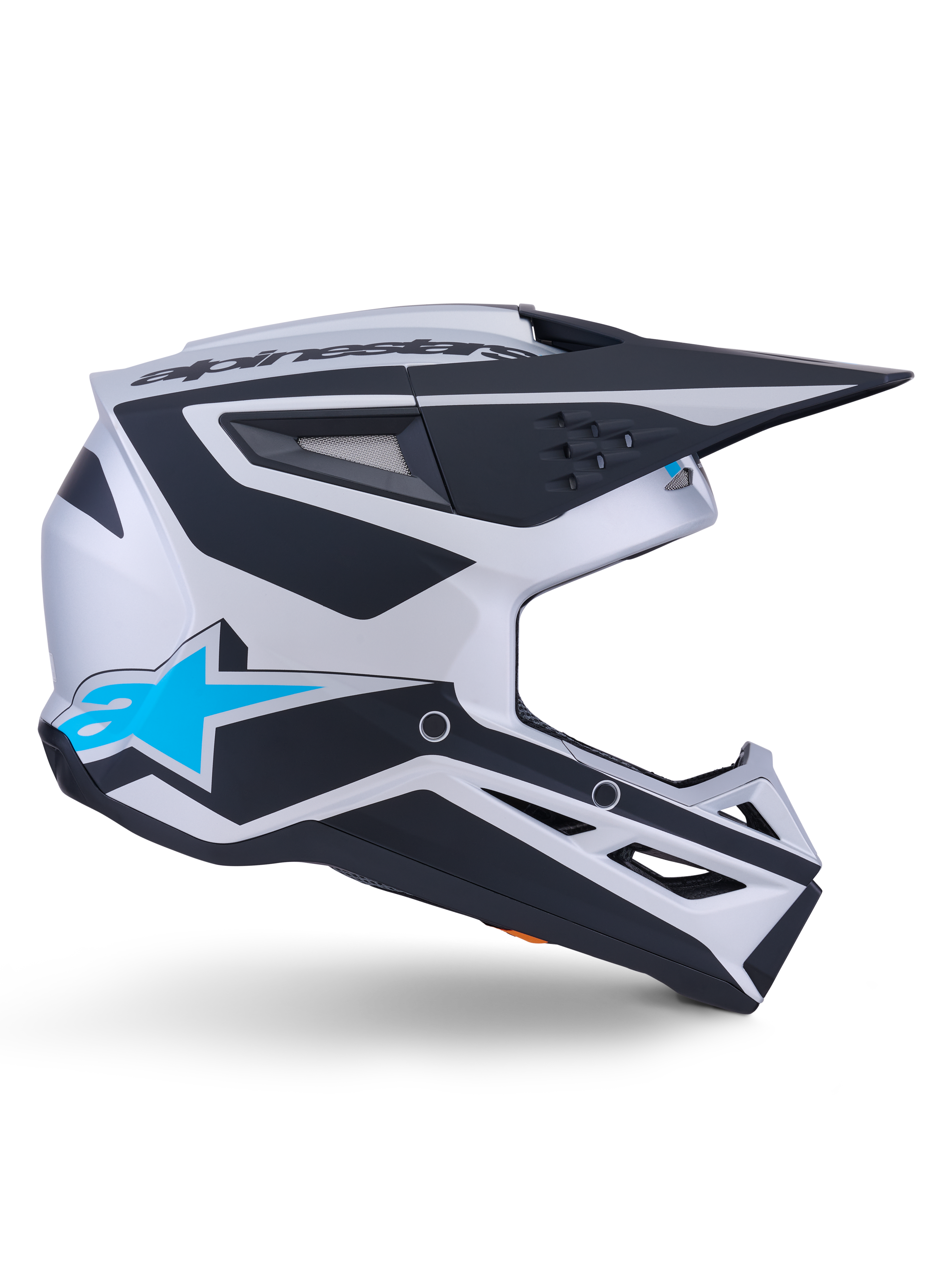 Alpinestars S-M3 Heat Helmet ECE 22.06, casco de motocross, plata, azul y negro mate, vista de perfil lateral con llamativos gráficos en negro, logotipo A-star en azul brillante, visera aerodinámica negra y múltiples puertos de ventilación para rendimiento off-road