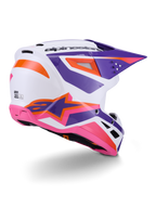 Alpinestars S-M3 Heat Helmet ECE 22.06, casco de motocross, blanco con detalles en púrpura, rosa y naranja, vista lateral trasera que muestra los puertos de ventilación y un logotipo de estrella llamativo, acabado brillante para rendimiento off-road