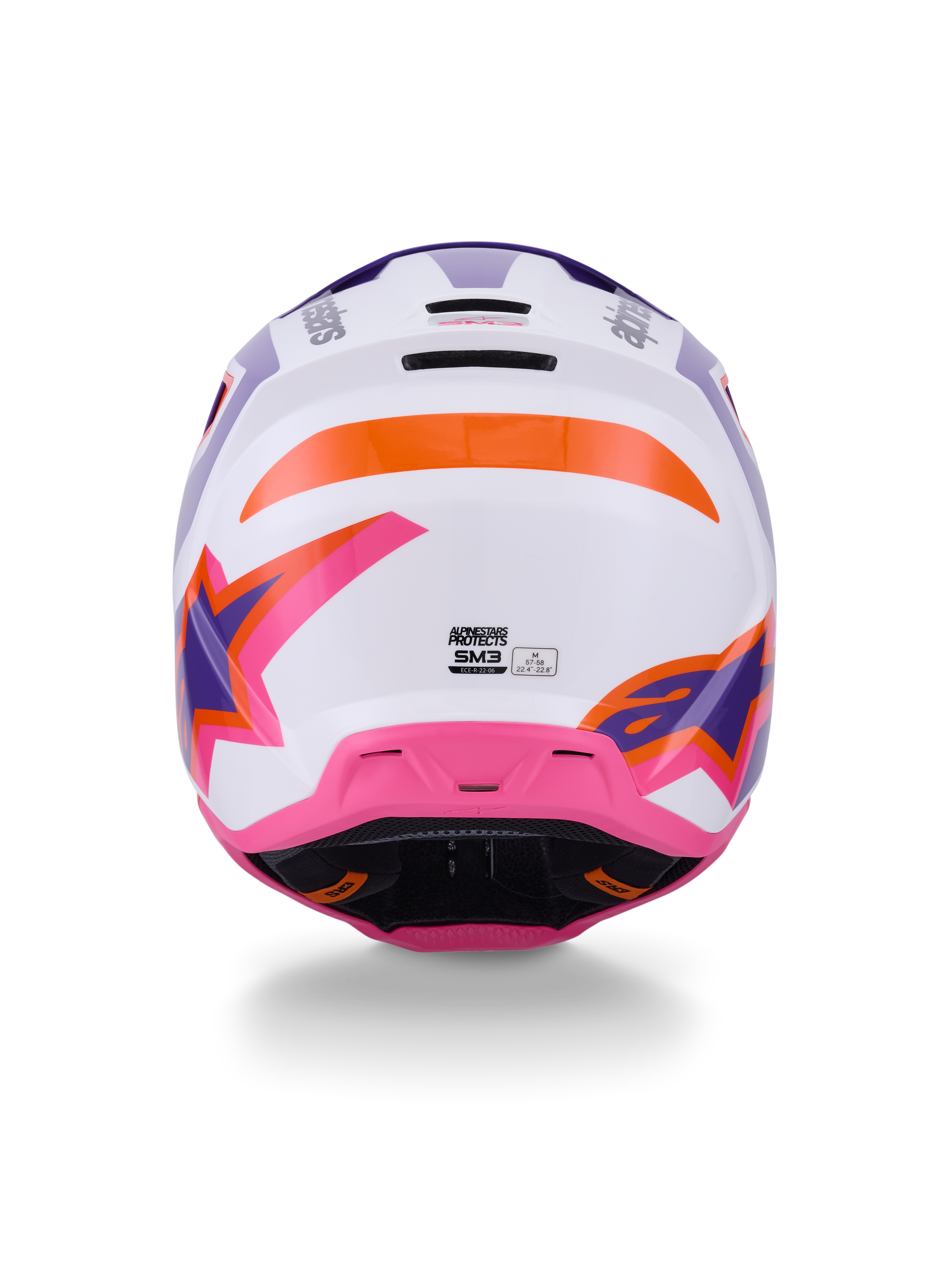 Casco Alpinestars S-M3 Heat ECE 22.06, casco de motocross, vista trasera en blanco, púrpura y rosa brillante con detalles en naranja, con gráficos de estrellas llamativos, puertos de salida de ventilación traseros y diseño de calota termo-inyectada para carreras off-road.