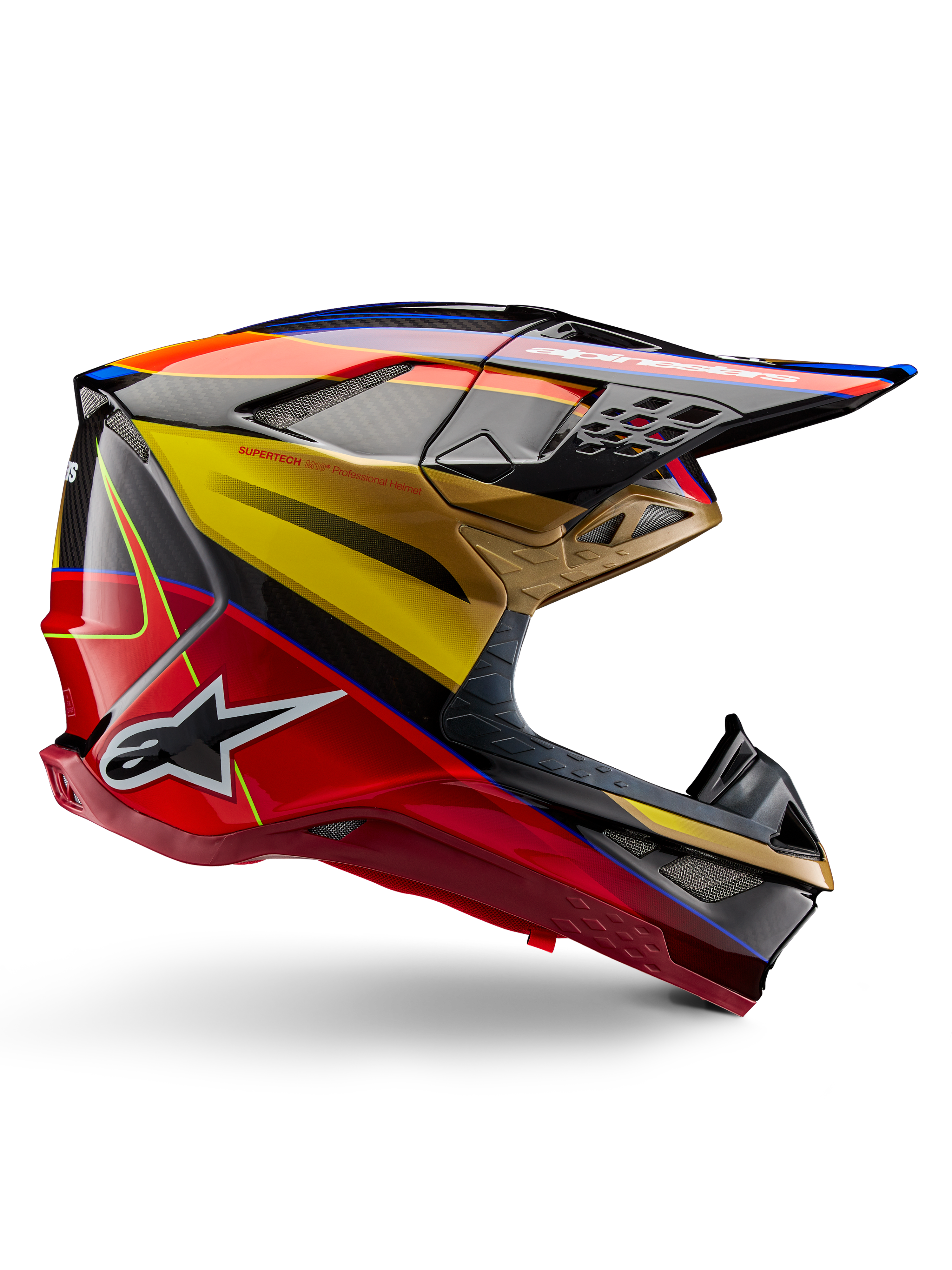 Alpinestars Supertech M10 Era Helmet, casco de motocross, amarillo dorado y rojo Rio brillante con detalles en azul y negro, diseño aerodinámico con visera integrada, múltiples puertos de ventilación cubiertos de malla y detalles de fibra de carbono, certificado ECE 22.06