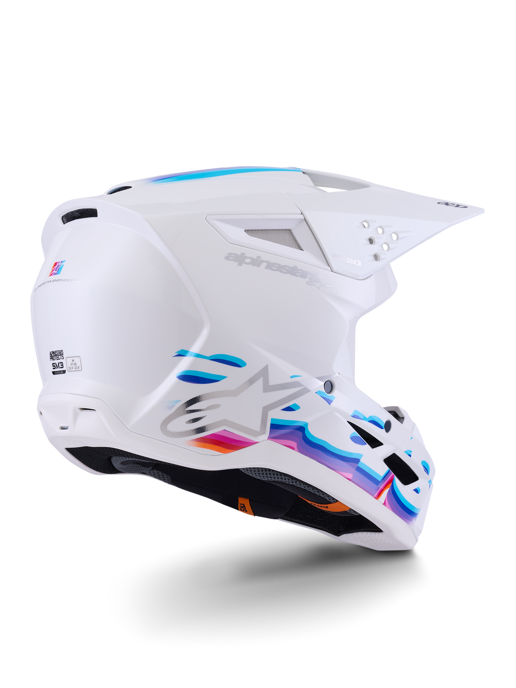 Casco Alpinestars S-M3 Force OCD, casco de motocross, blanco brillante con gráficos fluidos en azul y púrpura vibrantes, con logo Astar plateado y puertos de ventilación laterales, diseño de carcasa aerodinámica para carreras off-road