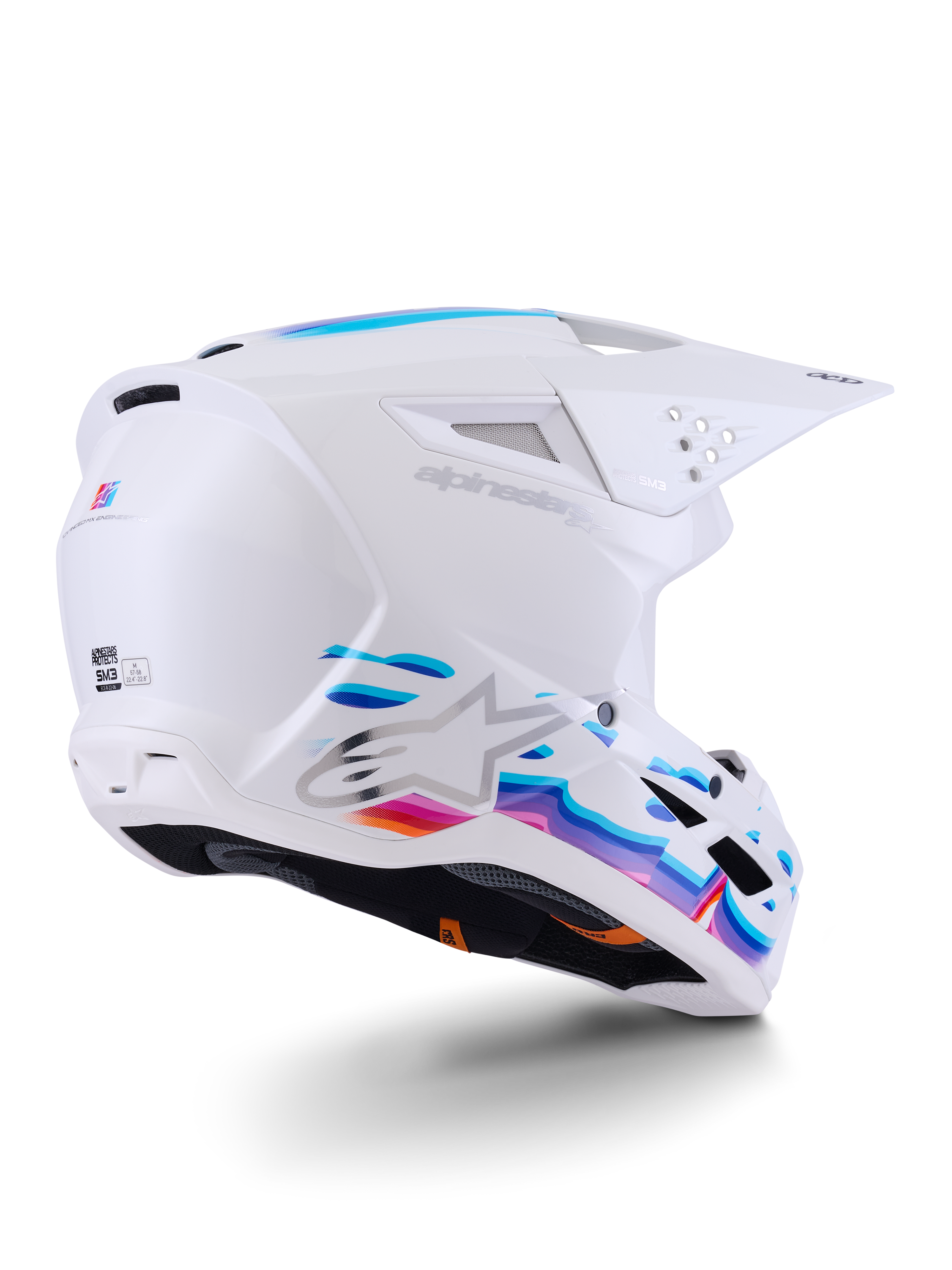 Casco Alpinestars S-M3 Force OCD, casco de motocross, blanco brillante con gráficos fluidos en azul y púrpura vibrantes, con logo Astar plateado y puertos de ventilación laterales, diseño de carcasa aerodinámica para carreras off-road