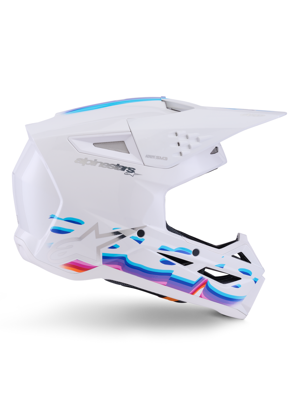 Casco Alpinestars S-M3 Force OCD, blanco brillante, casco de motocross con gráficos de ondas vibrantes en azul, morado y naranja, perfil lateral con visor aerodinámico y múltiples puertos de ventilación.