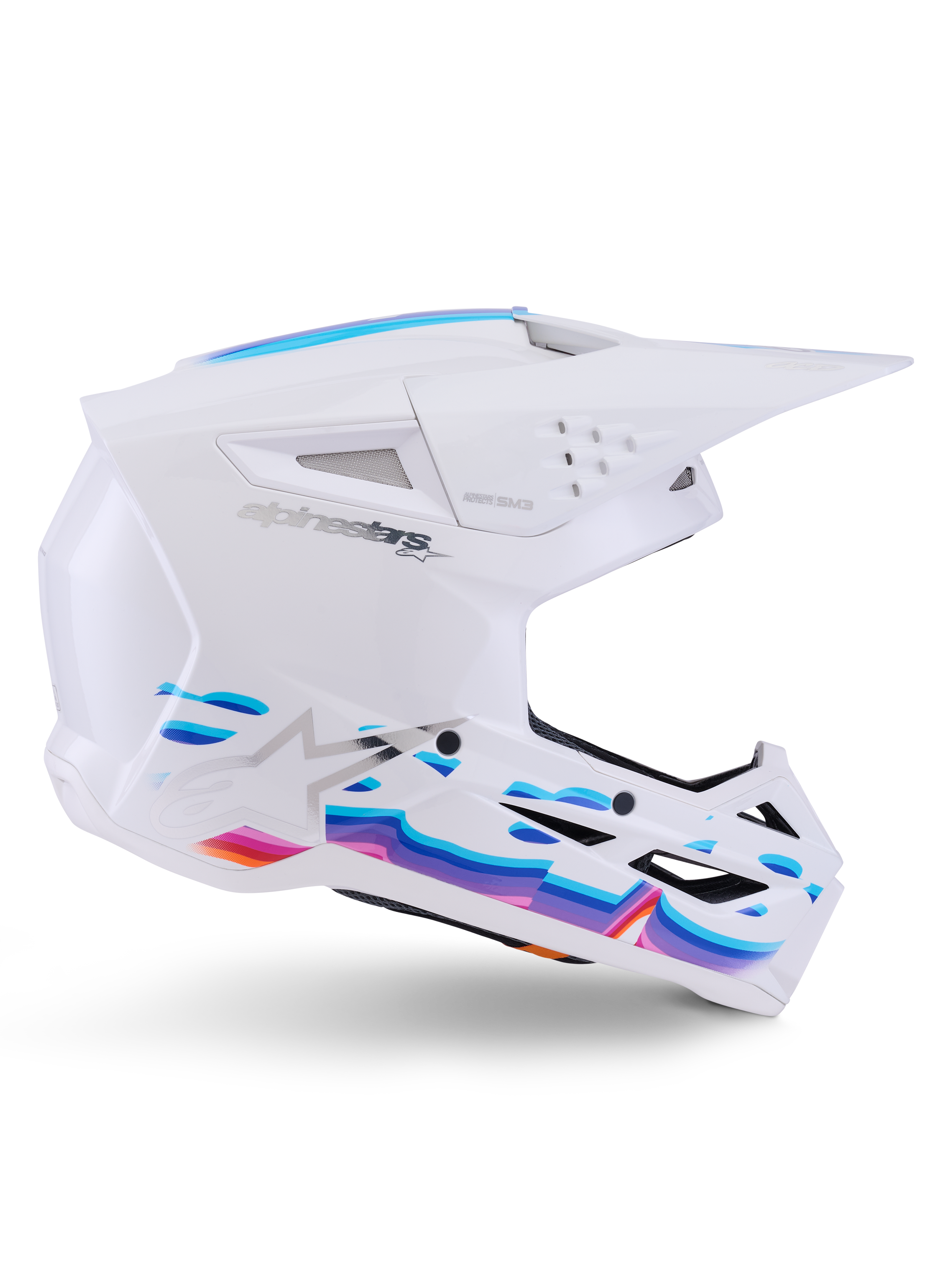 Casco Alpinestars S-M3 Force OCD, blanco brillante, casco de motocross con gráficos de ondas vibrantes en azul, morado y naranja, perfil lateral con visor aerodinámico y múltiples puertos de ventilación.