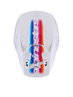 Casco Alpinestars S-M3 Force OCD, casco de motocross, blanco brillante, vista superior con una vibrante franja central multicolor en azul, púrpura, rojo y naranja, marca Alpinestars y logotipo de la estrella en blanco, protección profesional para la cabeza en off-road